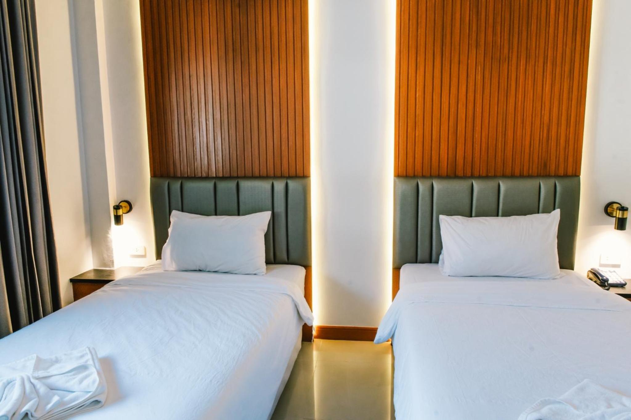 Deluxe Twin Room - Photo 11