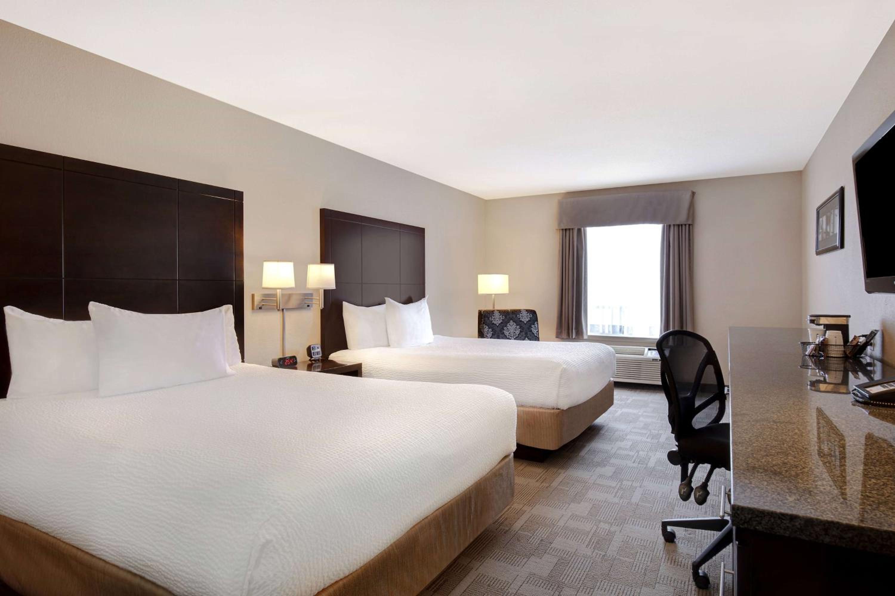 Deluxe Queen Room with Two Queen Beds - Non-Smoking - Photo 1