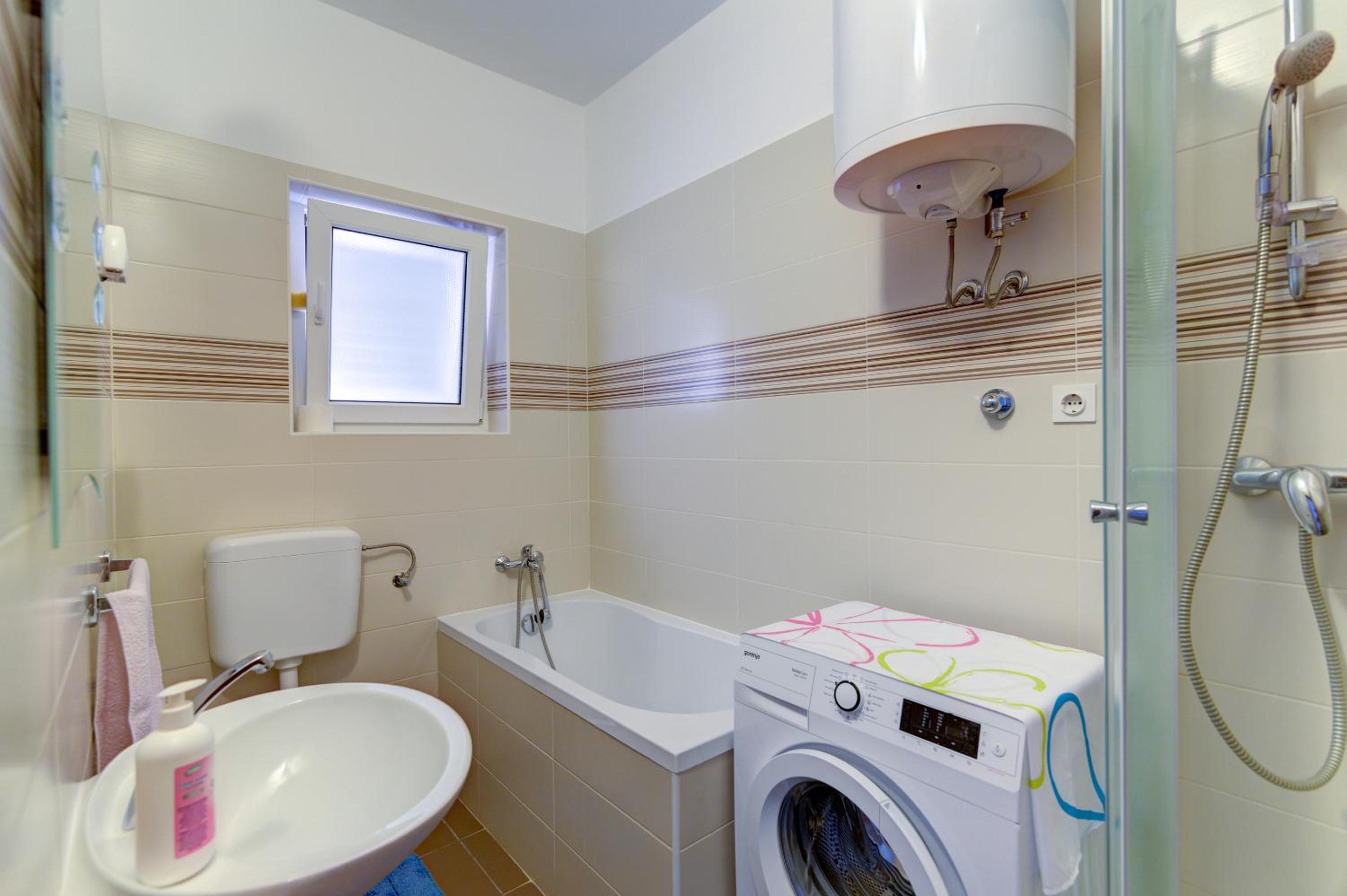 Three-Bedroom Apartment - Photo 31