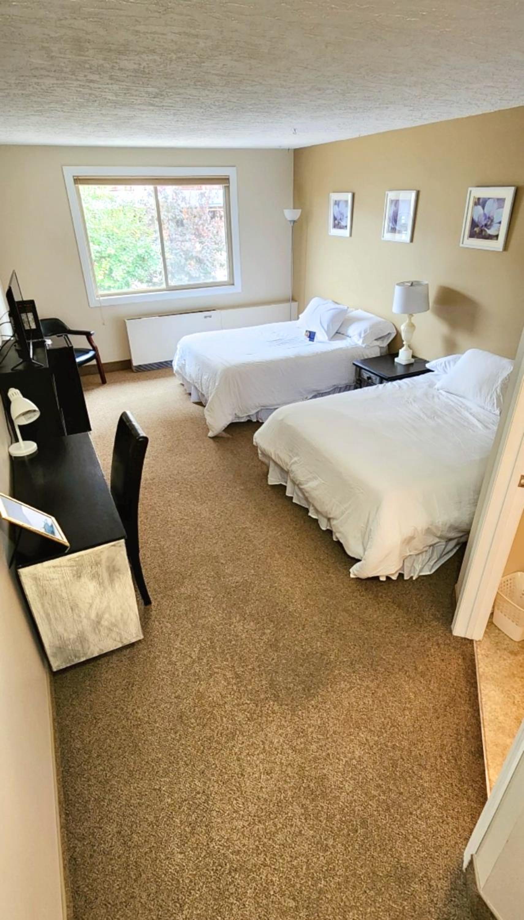 Queen Room with Two Queen Beds - Photo 1