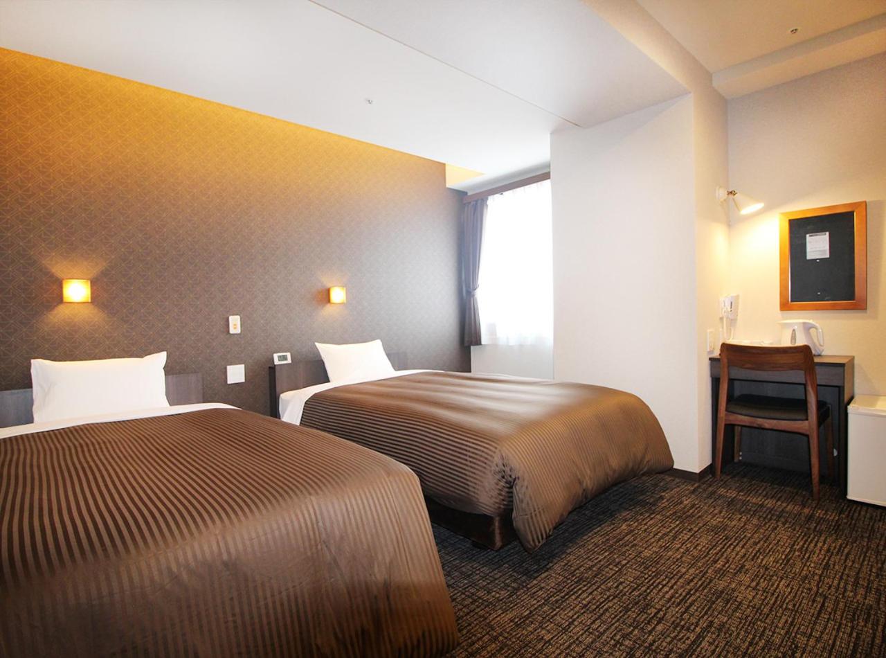 Twin Room - Non Smoking - Photo 1