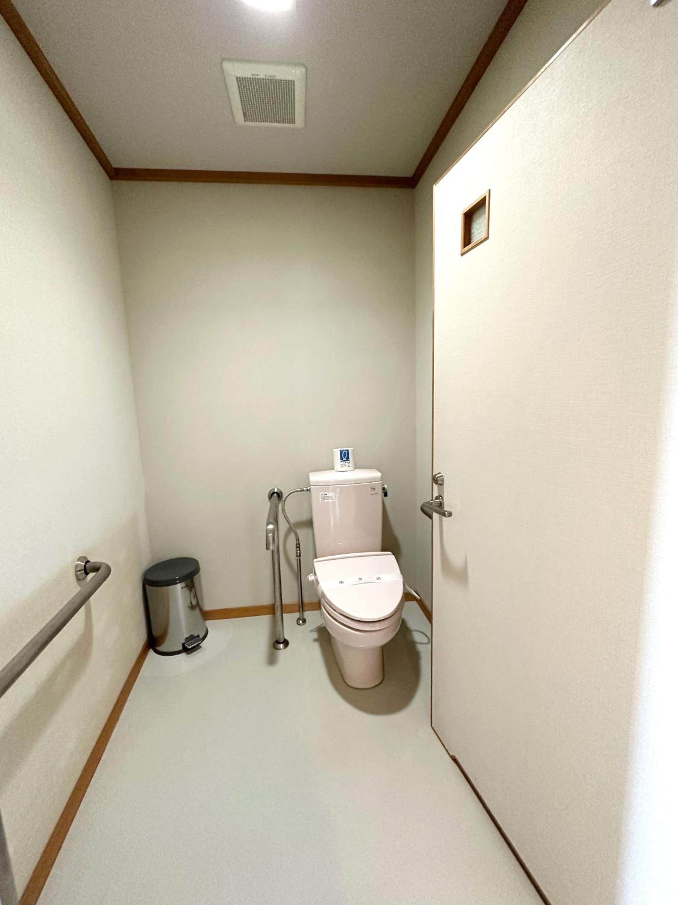 Japanese-Style Family Room with Toilet  photo 3