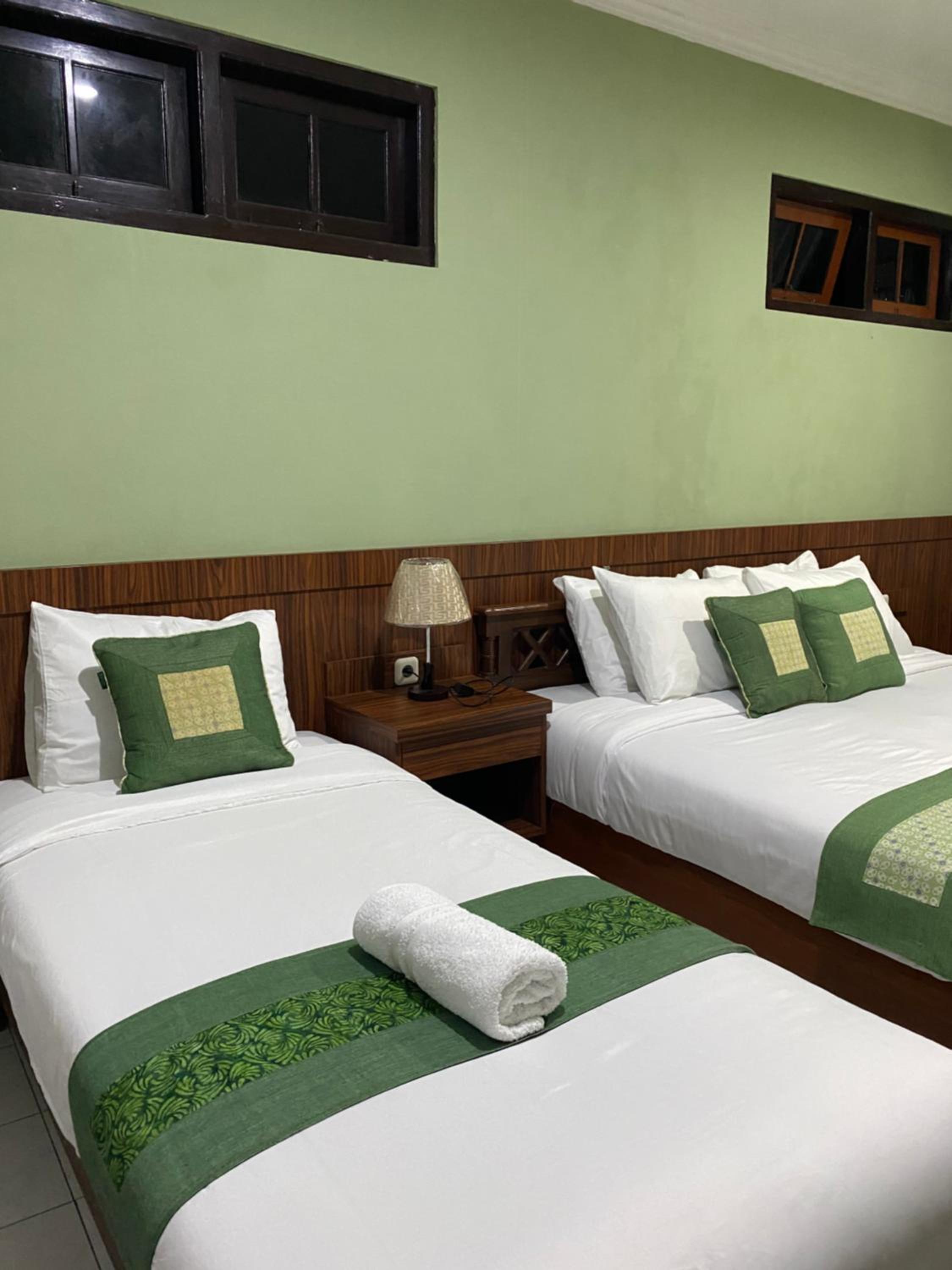 Deluxe Double Room (2 Adults + 1 Child) photo 3