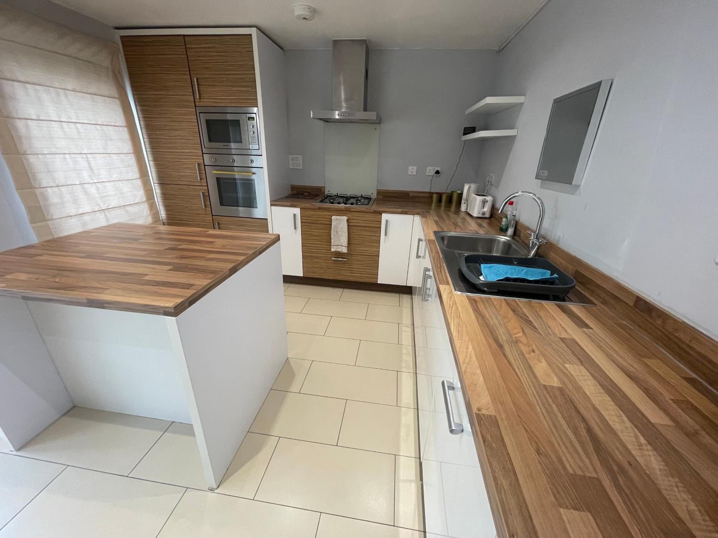 Four-Bedroom House - Photo 13
