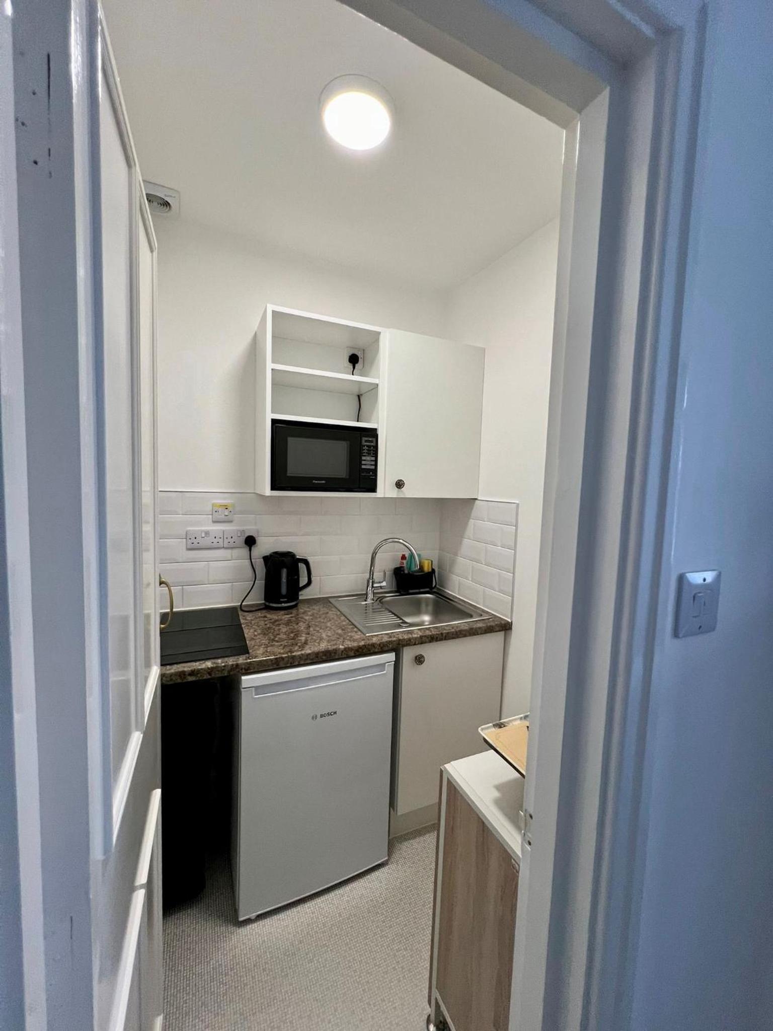 Triple Room with Kitchenette - Photo 7