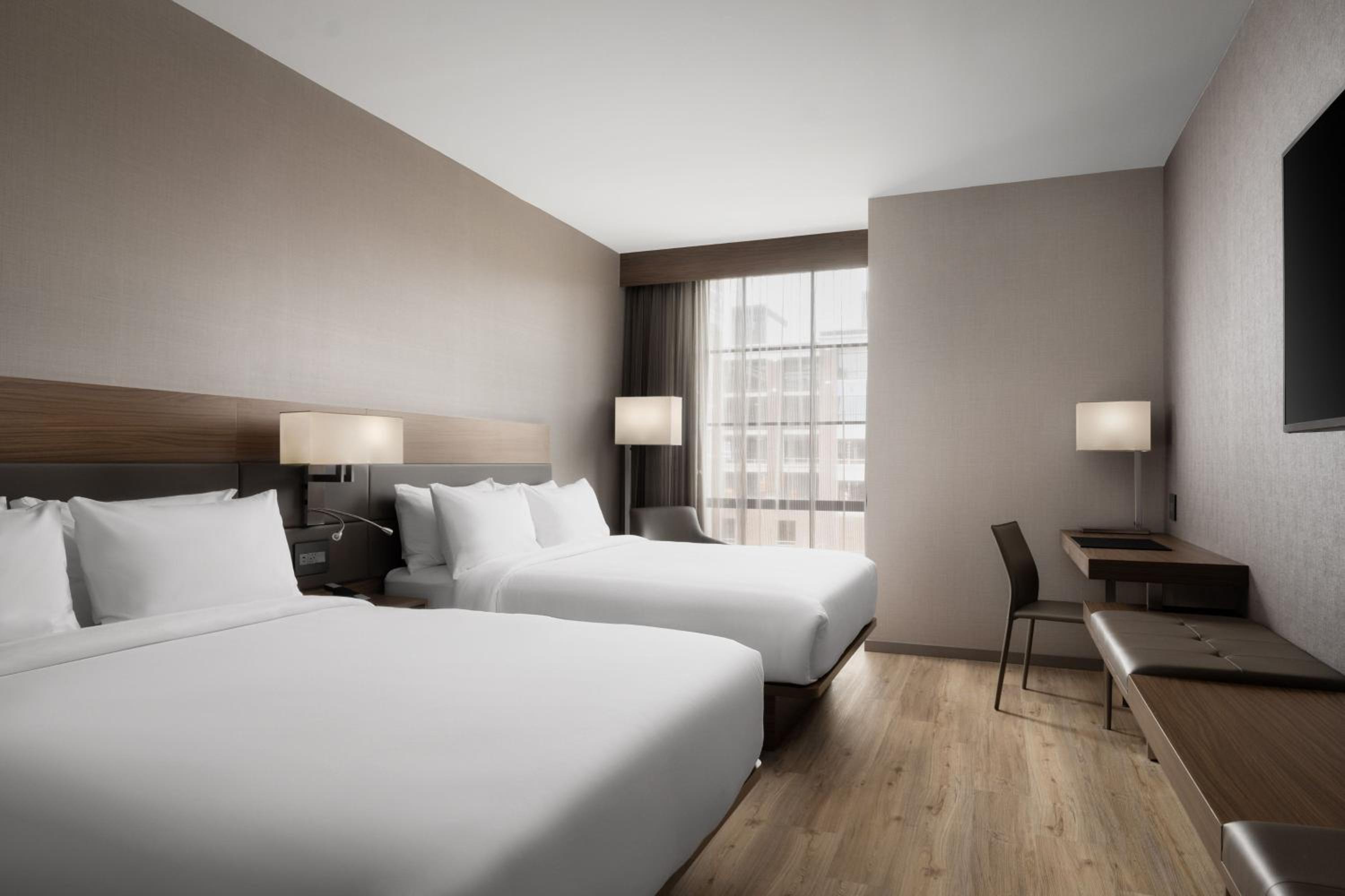 Standard Queen Room with Two Queen Beds - Photo 5