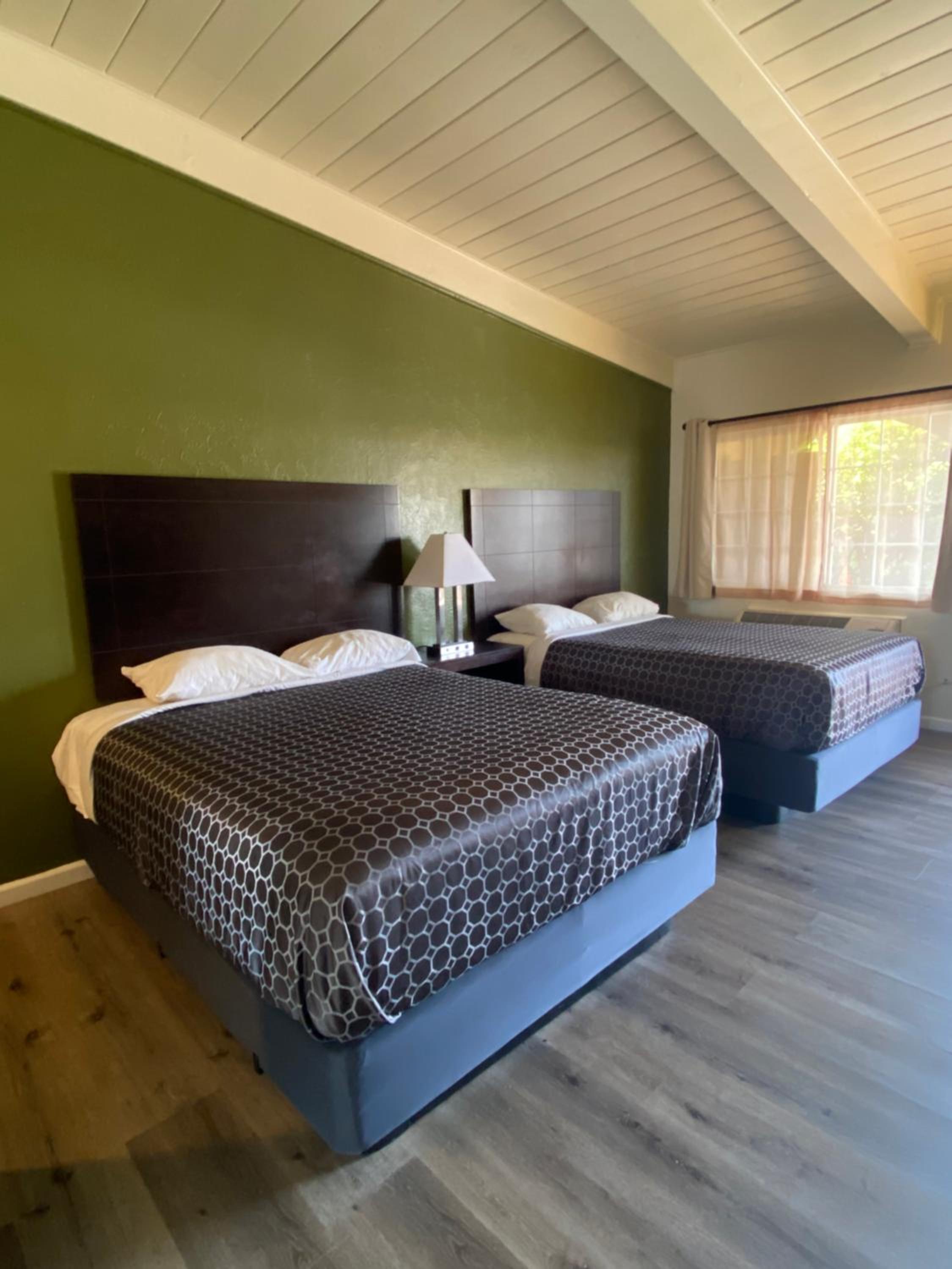 Queen Room with Two Queen Beds - Photo 1