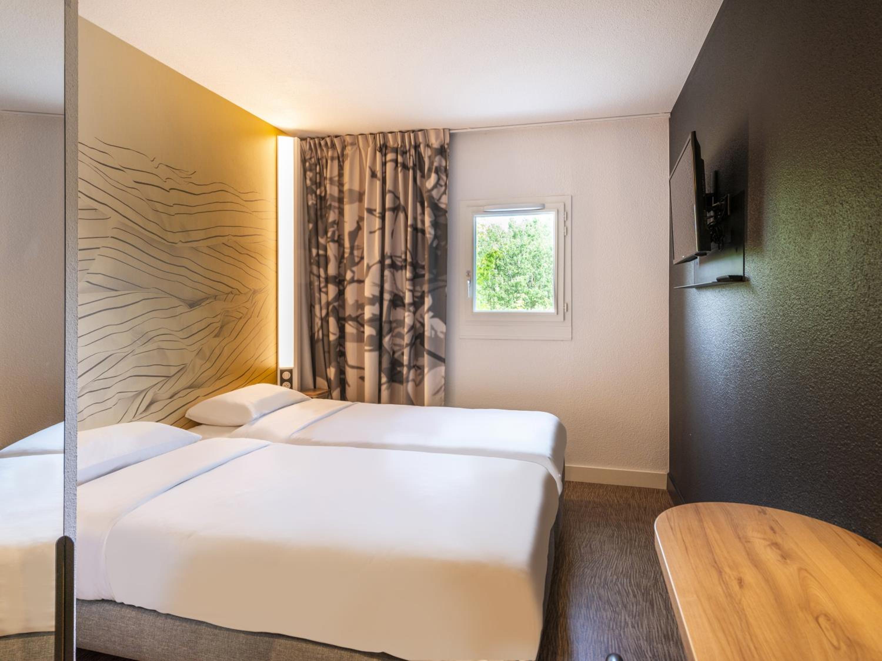 Twin Room - Photo 1