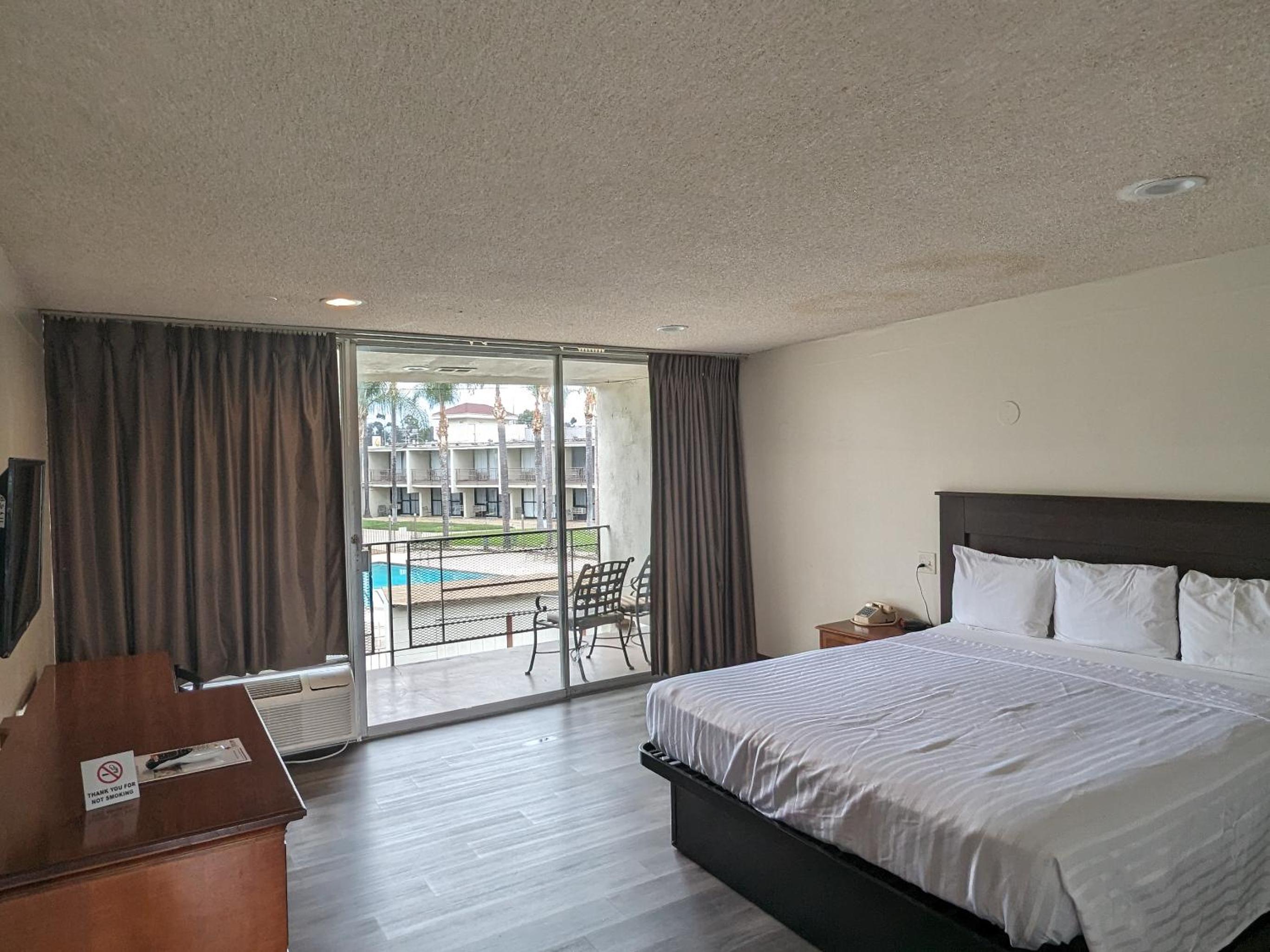 King Bed Room Exterior at Valley Inn in Mission Hills