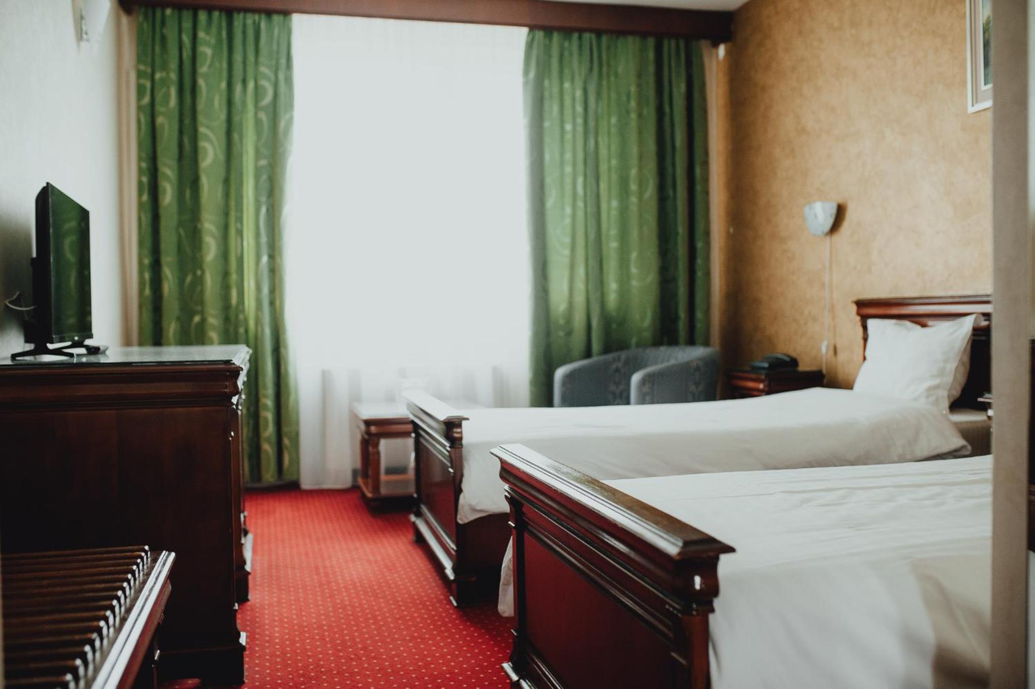 Standard Twin Room - Photo 11