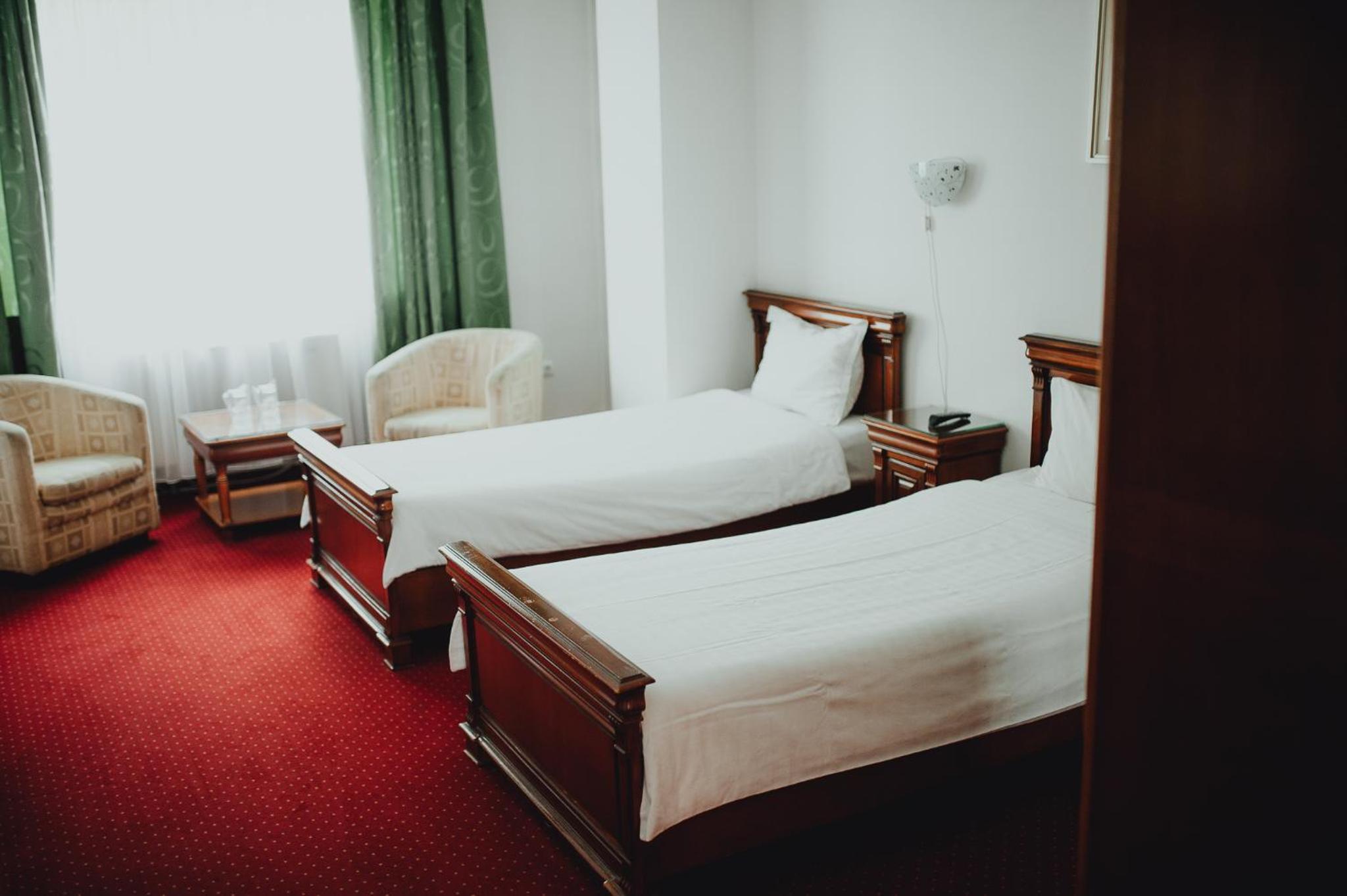 Standard Twin Room - Photo 7
