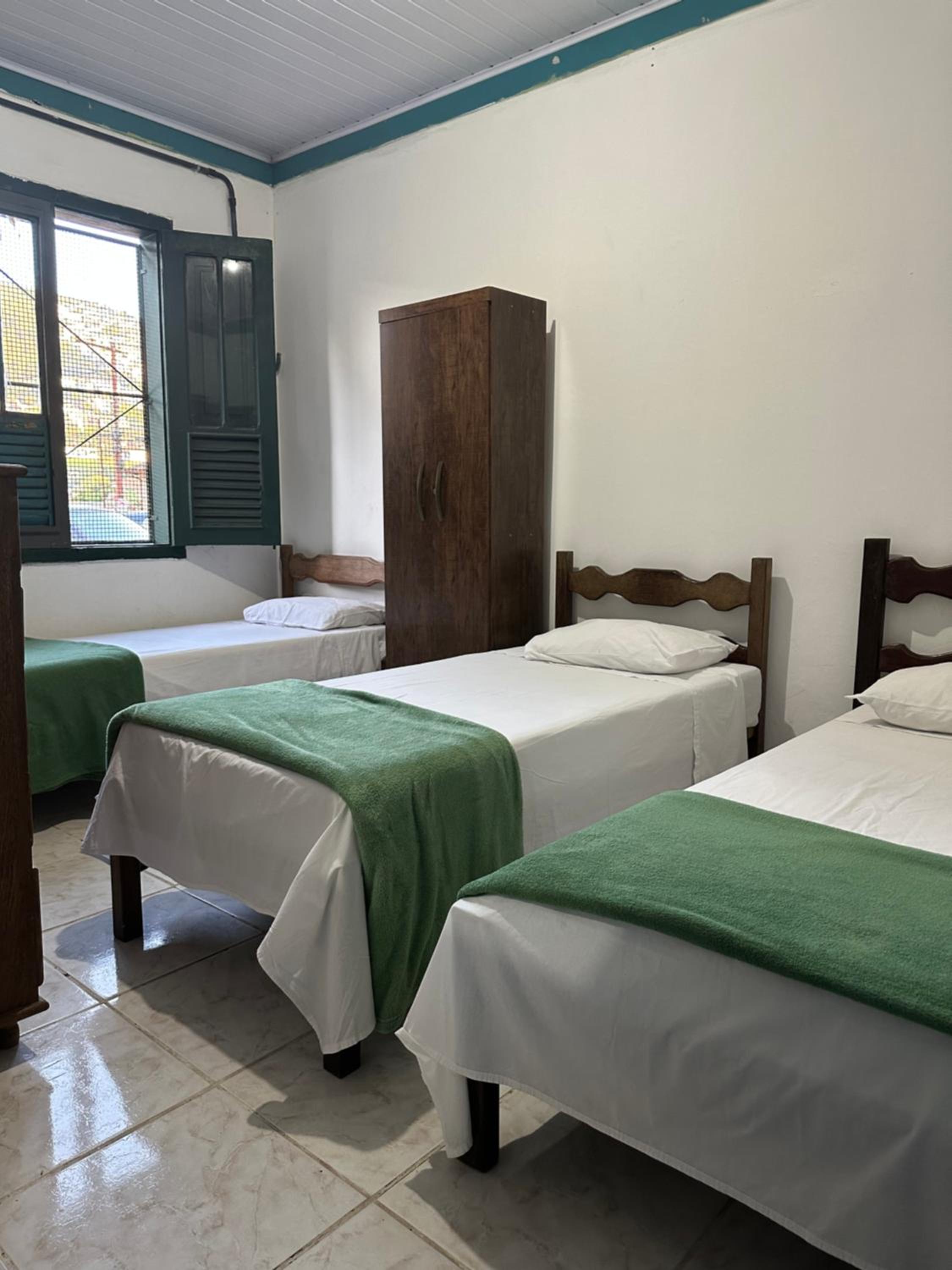 Economy Triple Room with Shared Bathroom photo 2