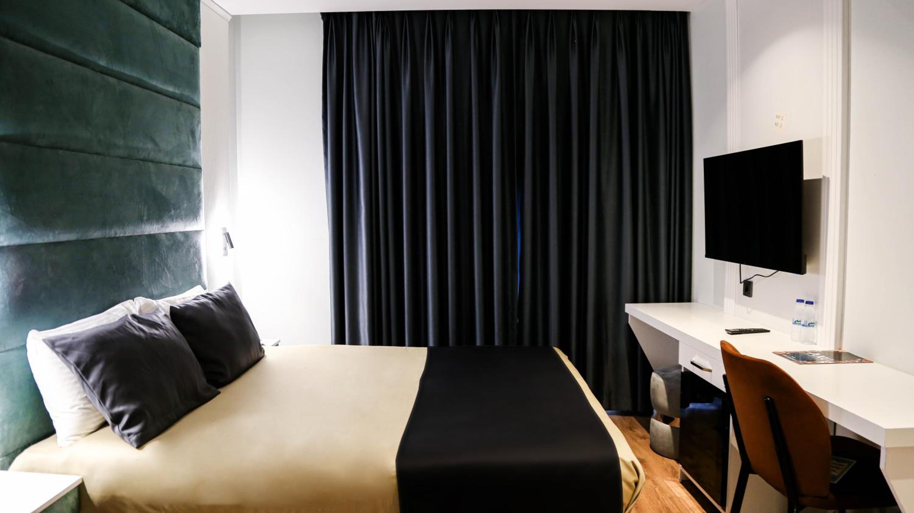 Deluxe Triple Room - Photo 2