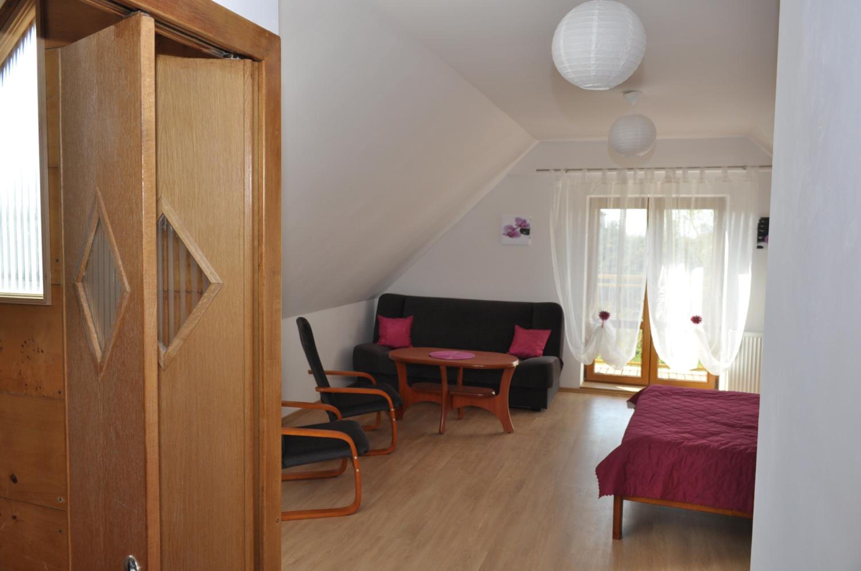 Apartment with Balcony - Photo 2
