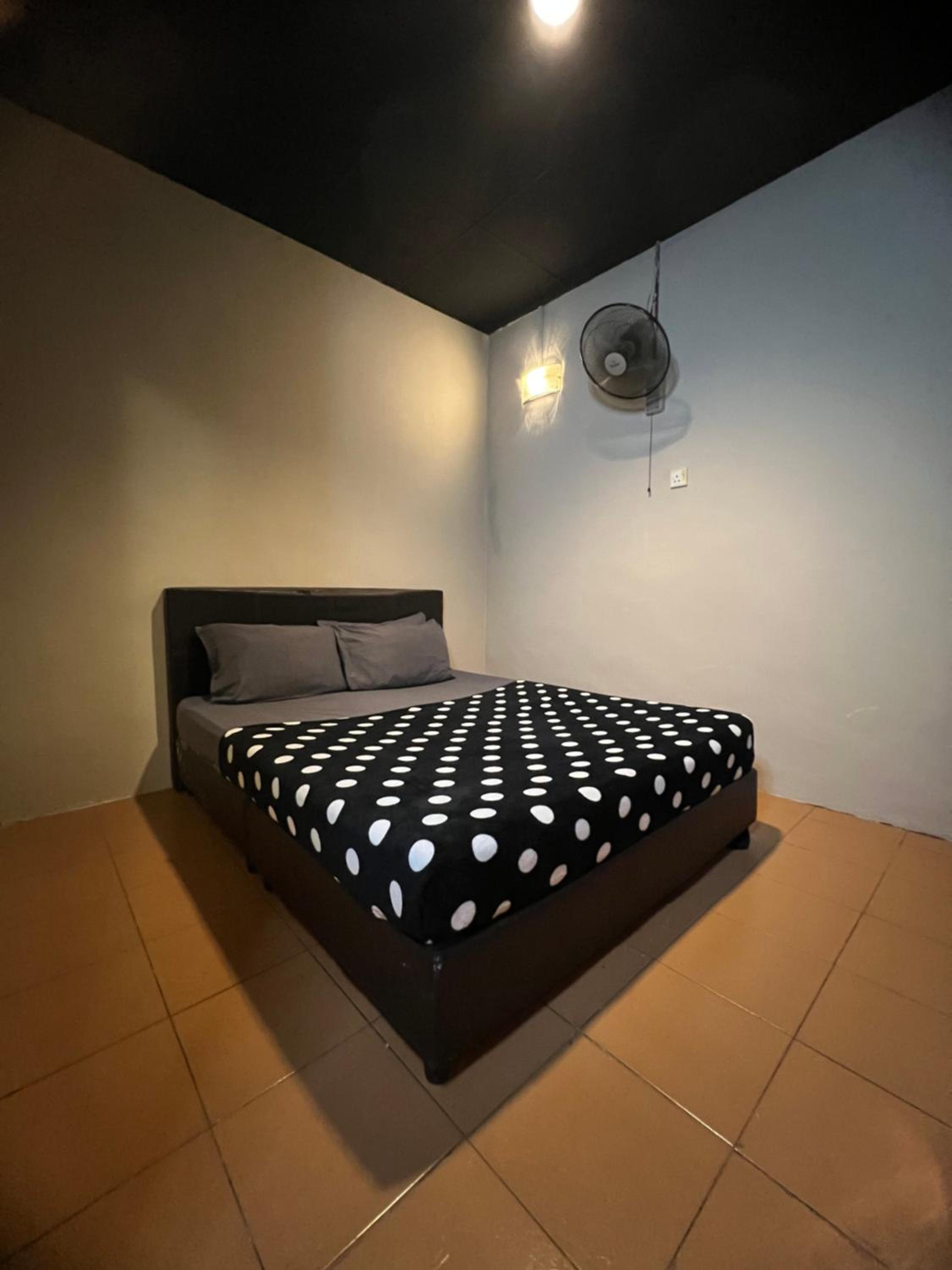 Queen Room with Shared Bathroom No Window