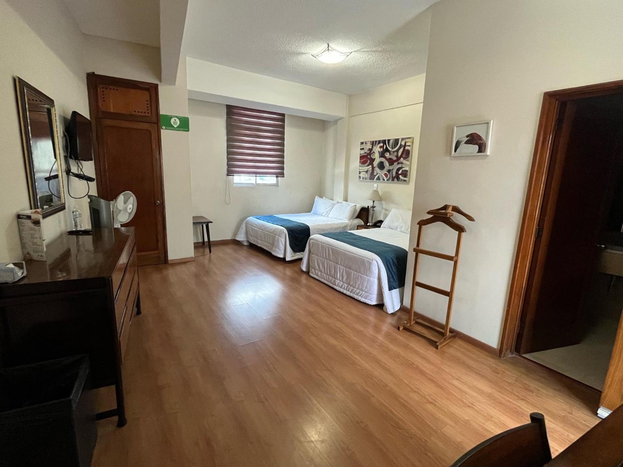 Double Room with Two Double Beds photo 1