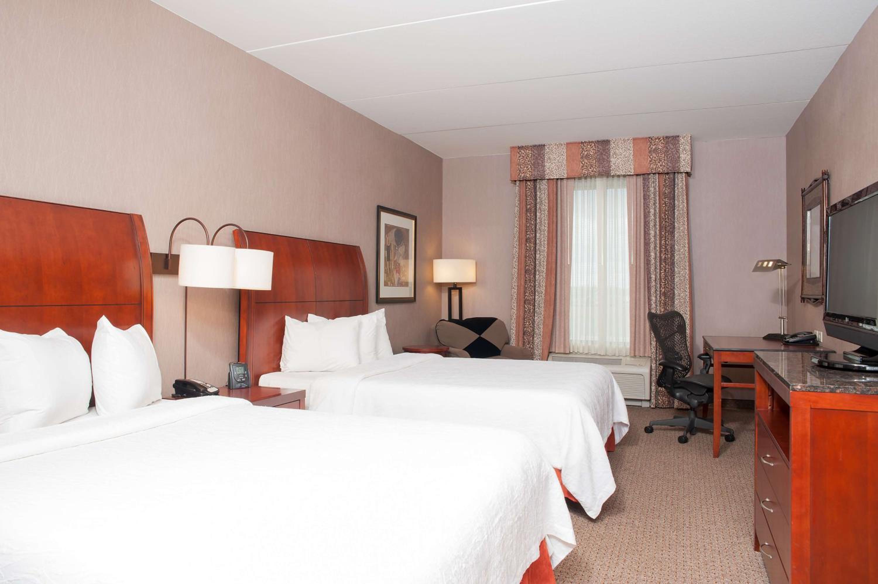 Premium Queen Room with Two Queen Beds - Photo 1