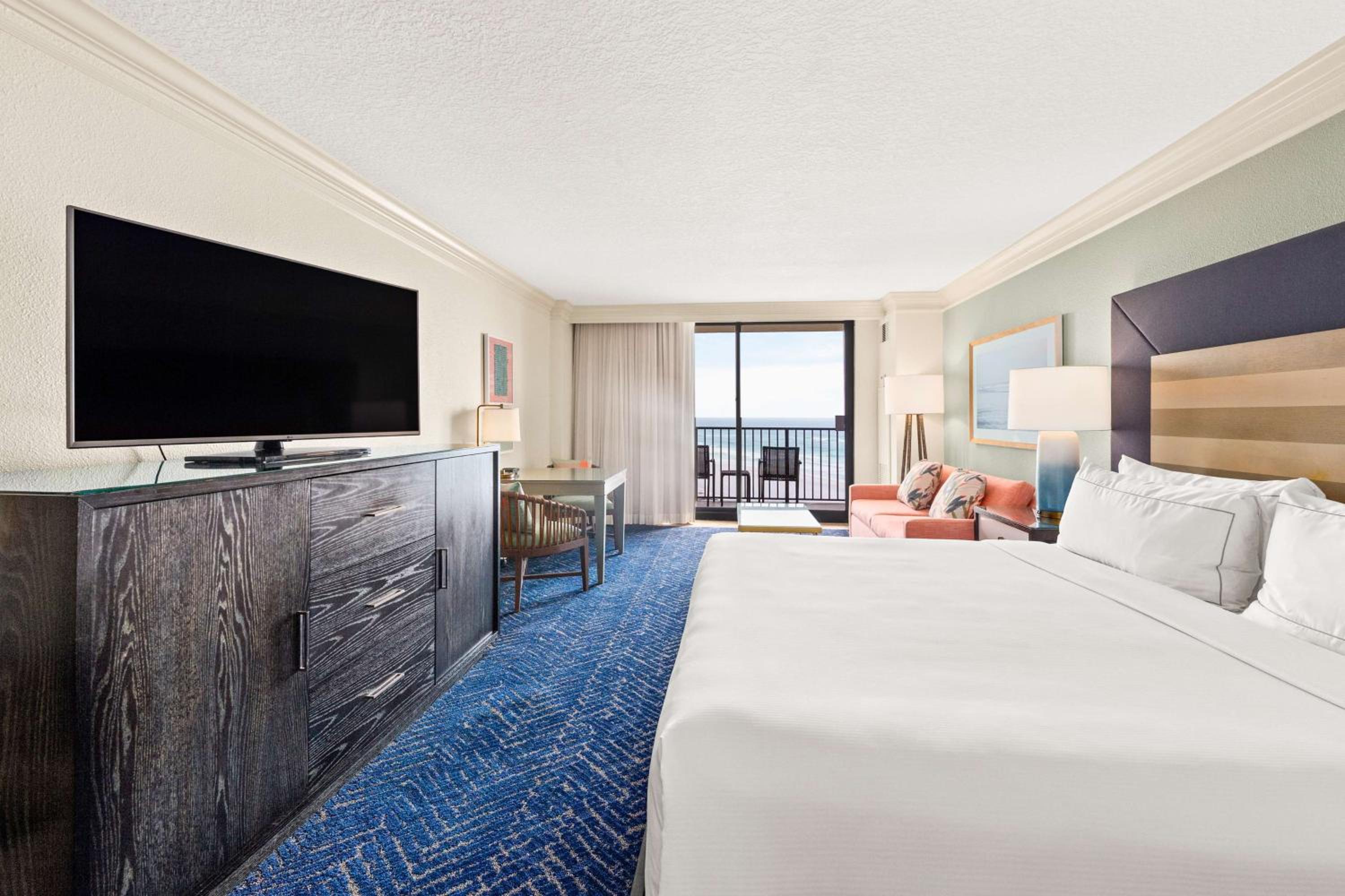 King Room with Sofa Bed and Beach View - Photo 1