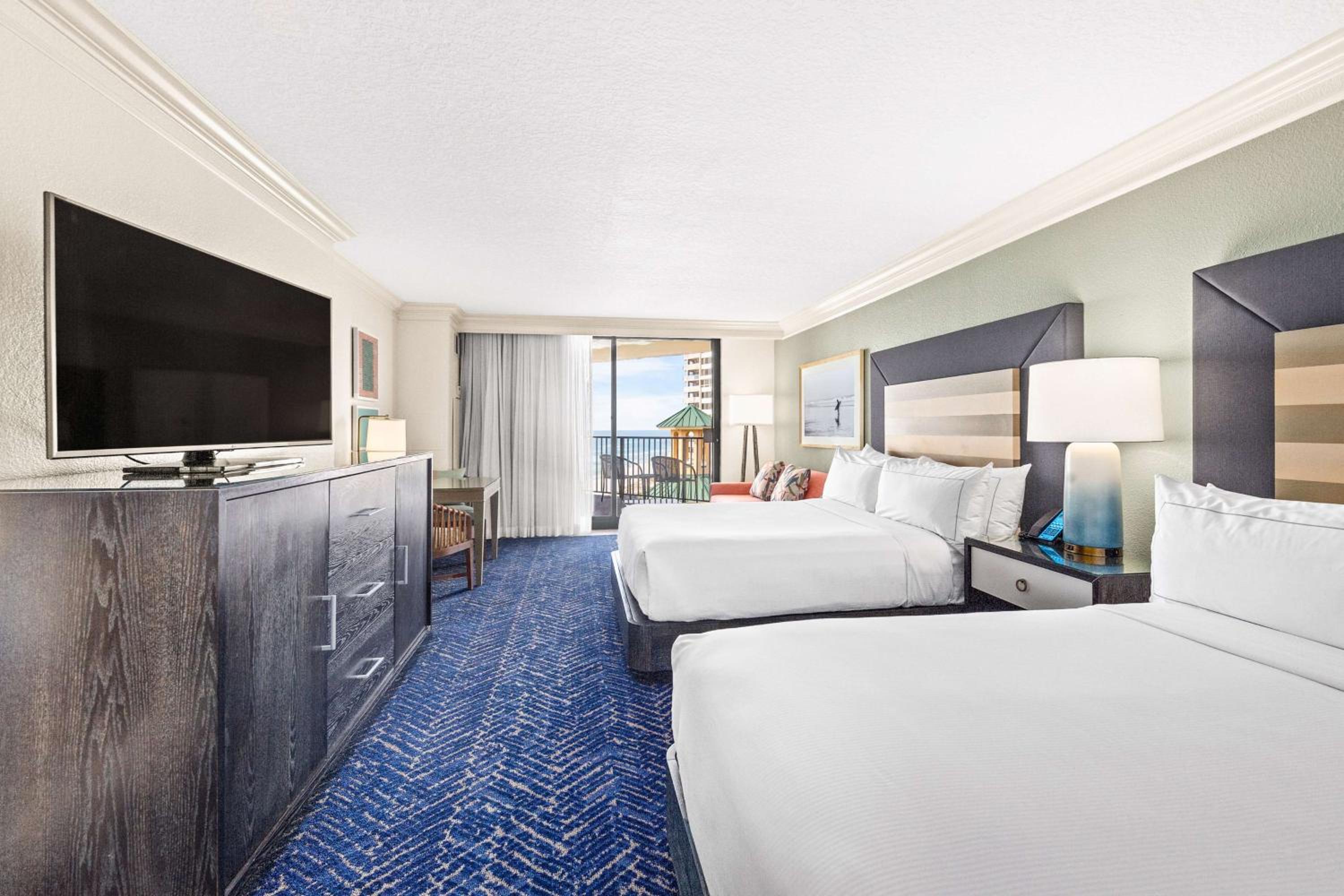 Queen Room with Sofa Bed and Partial Beach View
