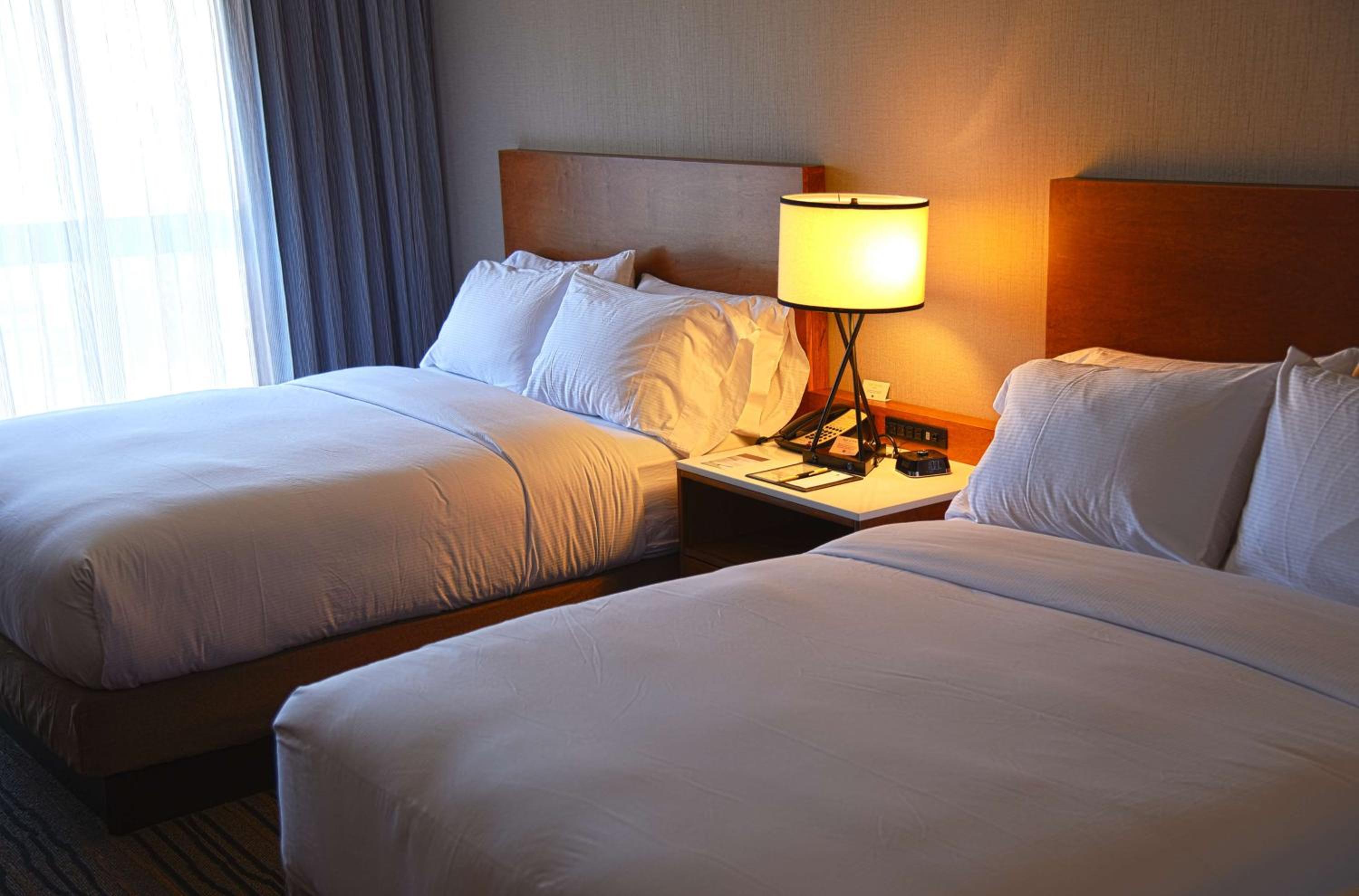 Queen Room with Two Queen Beds - Photo 1