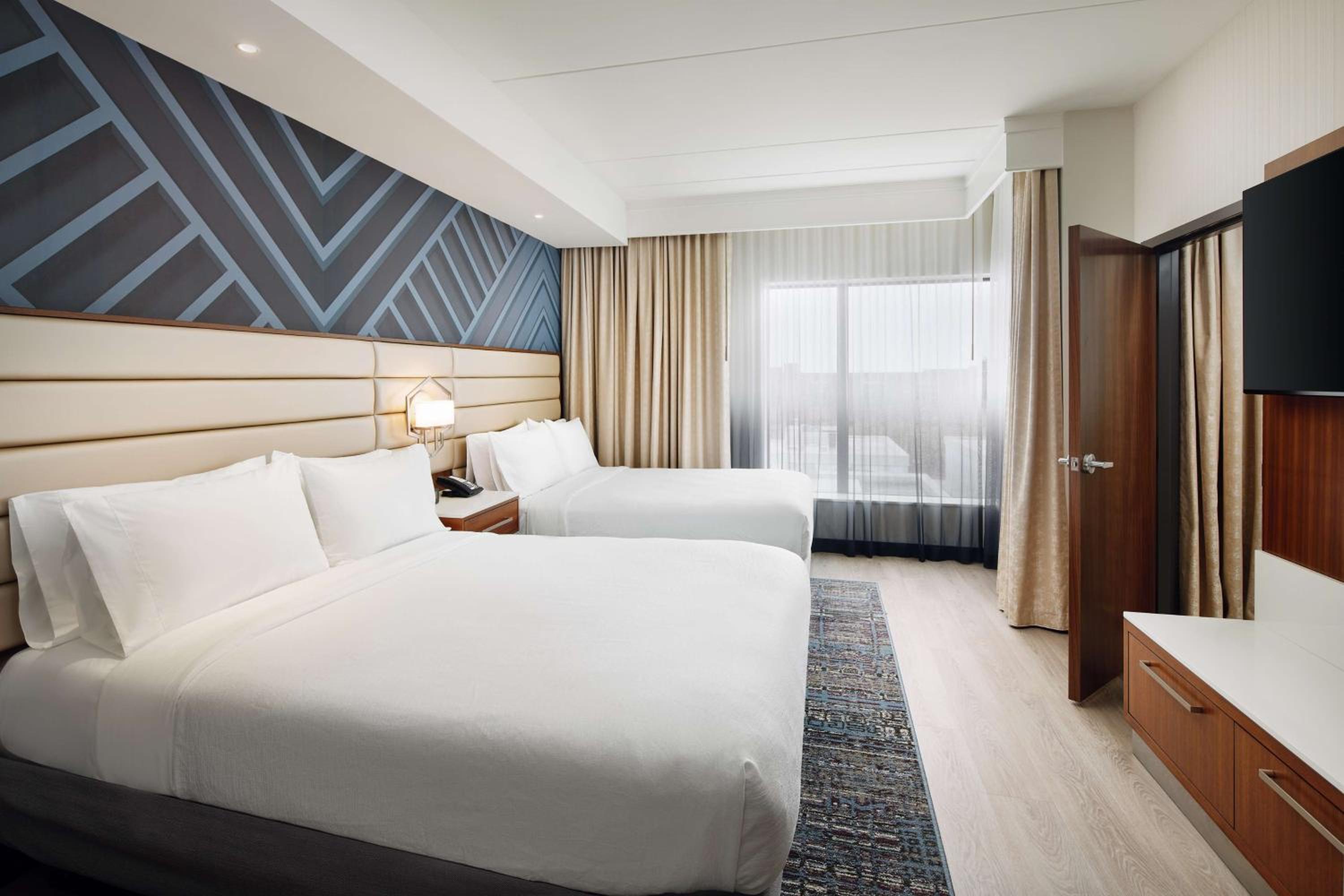 Two-Room Queen Suite with Two Queen Beds - Photo 1