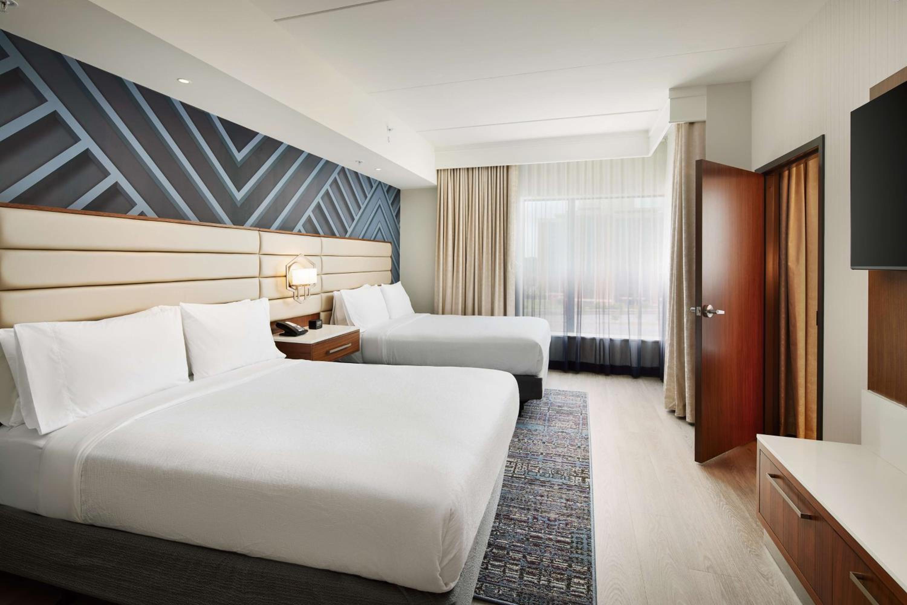 Two-Room Queen Suite with Tub - Mobility/Hearing Accessible - Photo 2