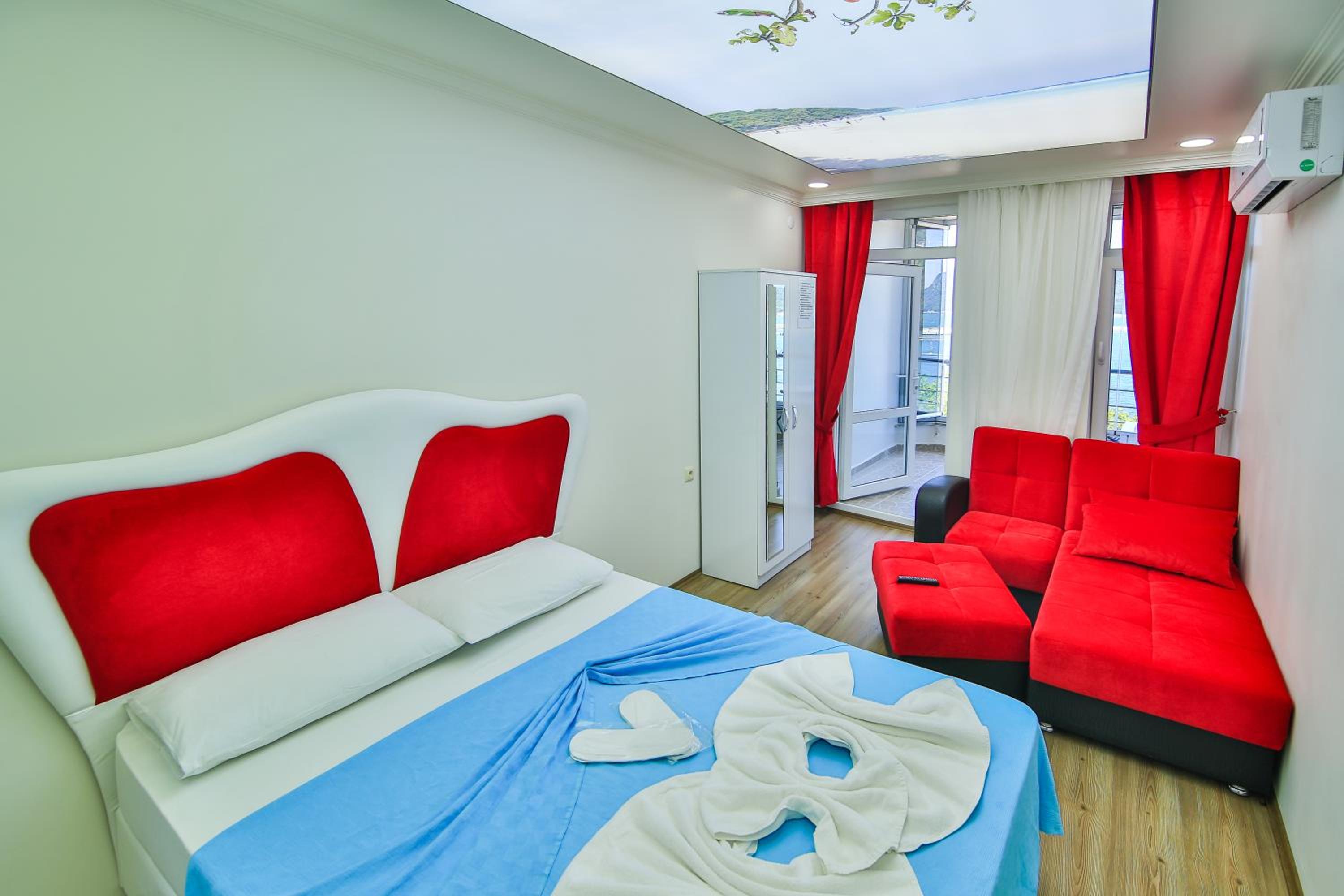 Comfort Quadruple Room with Balcony and Sea View