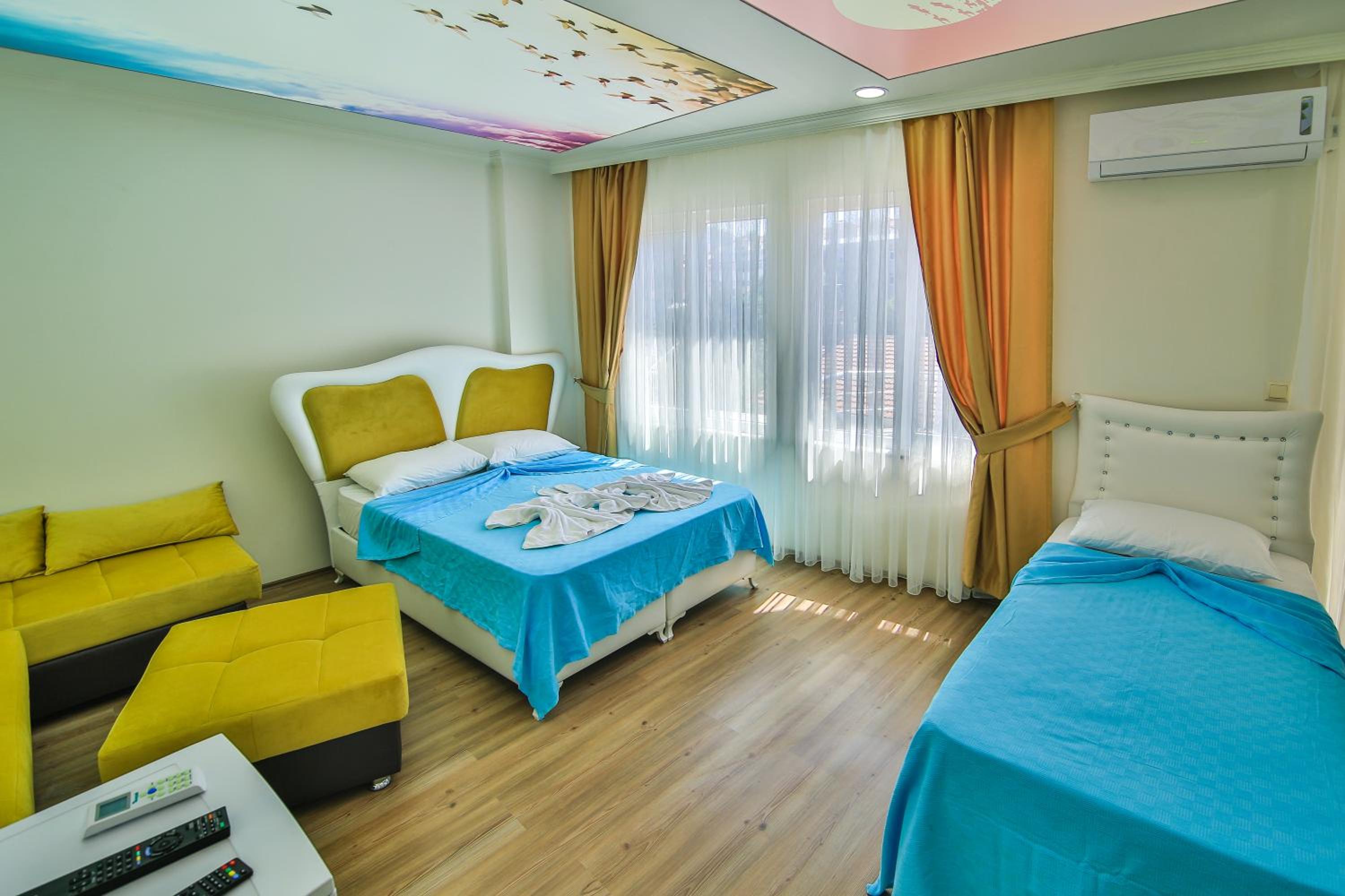 Family Room With City View and Kitchenette