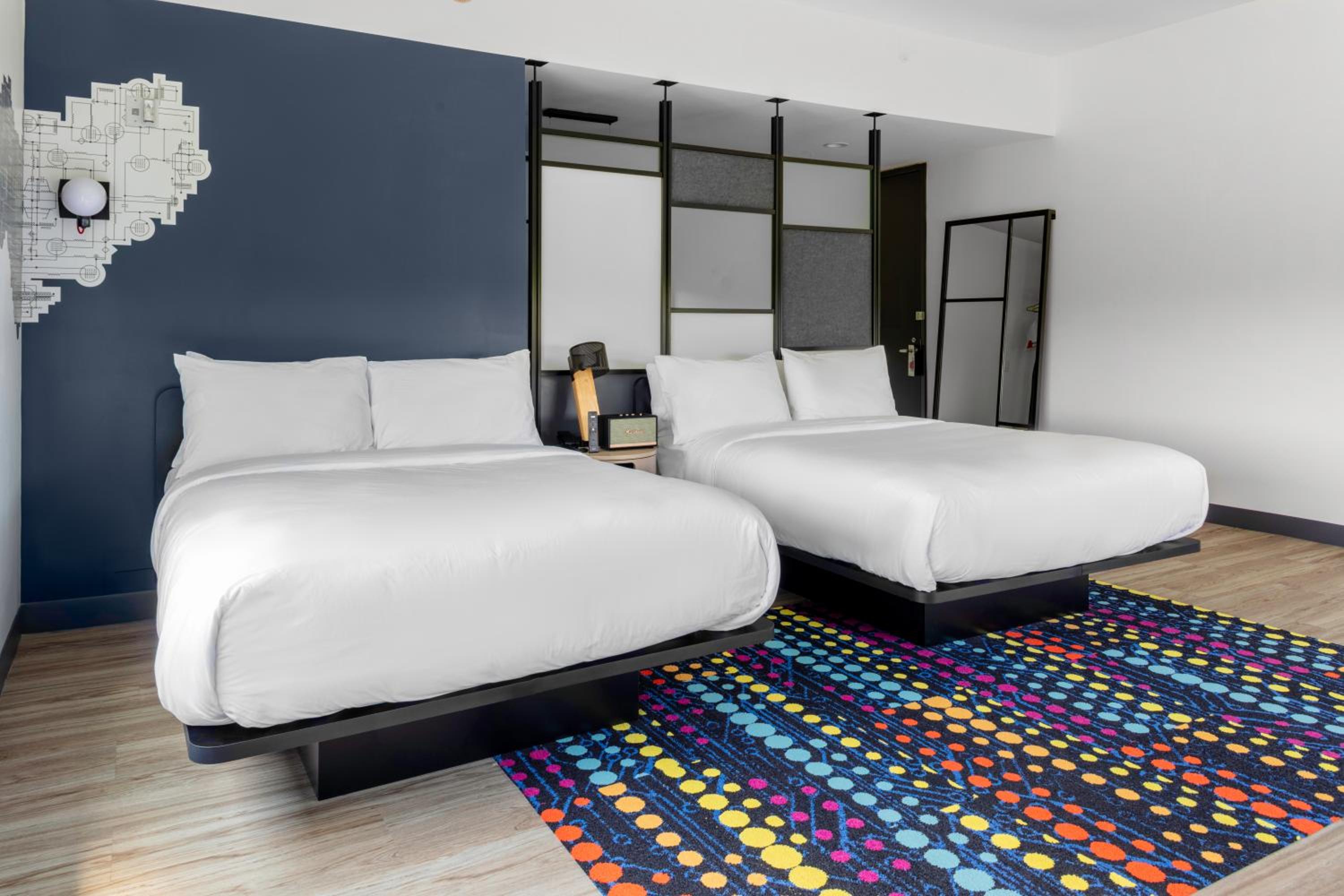 Queen Room with Two Queen Beds - Photo 1
