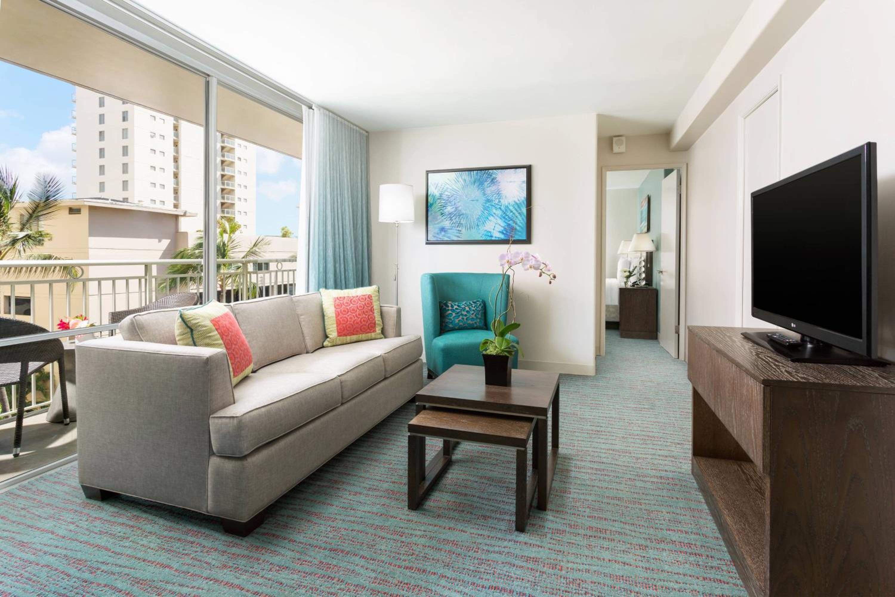 Corner Queen Suite with Sofa Bed - Photo 1
