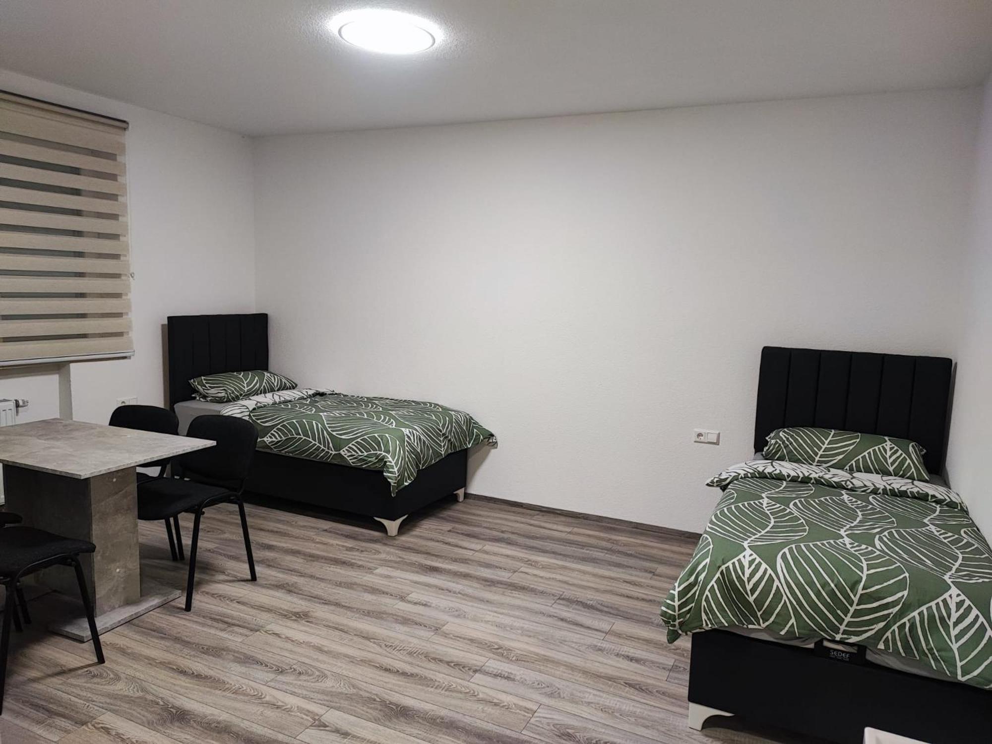 Three-Bedroom Apartment - Photo 10