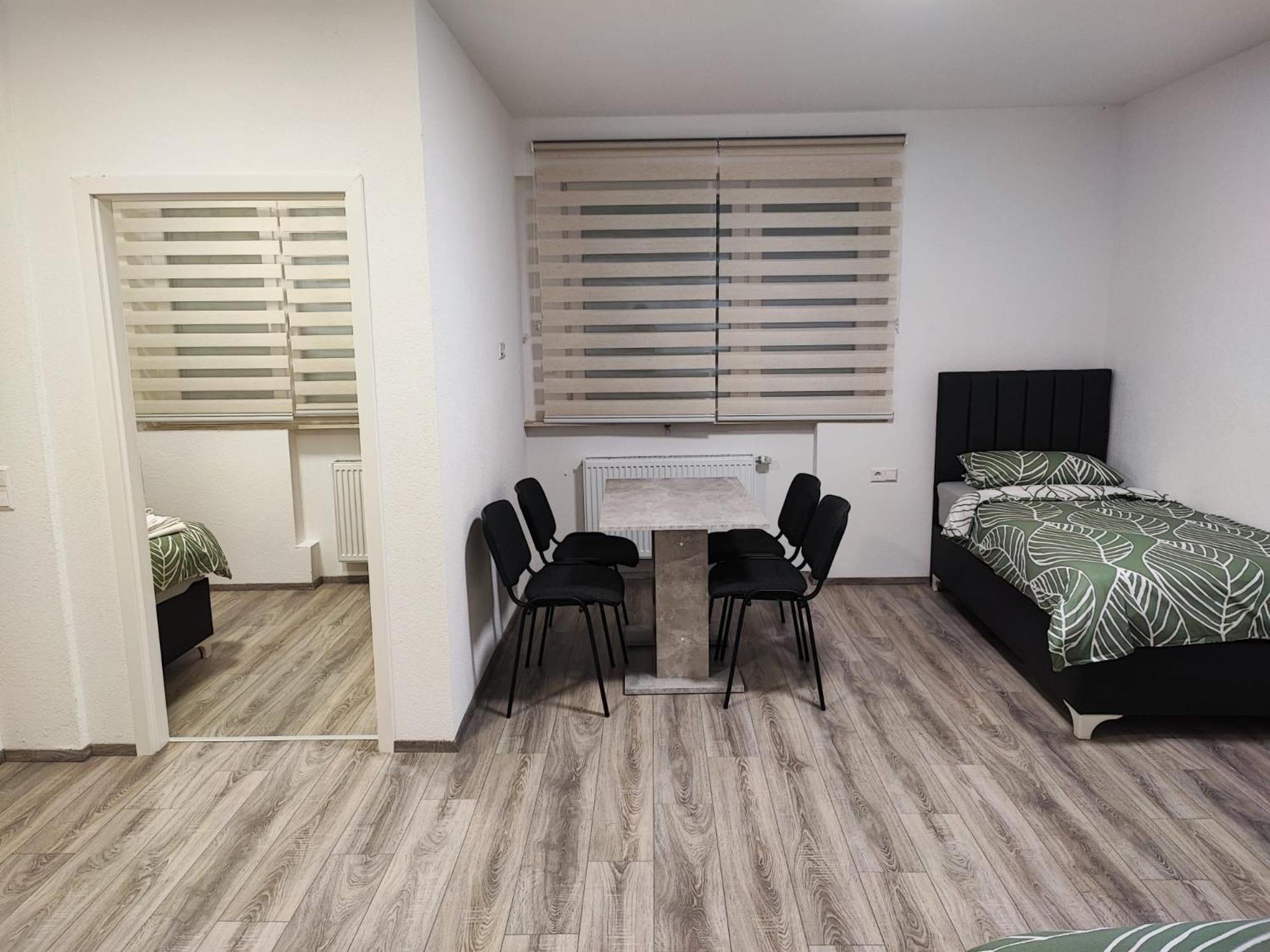 Three-Bedroom Apartment - Photo 11