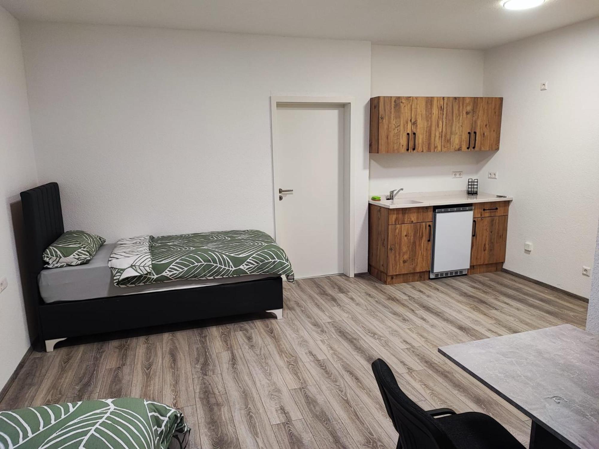 Three-Bedroom Apartment - Photo 6