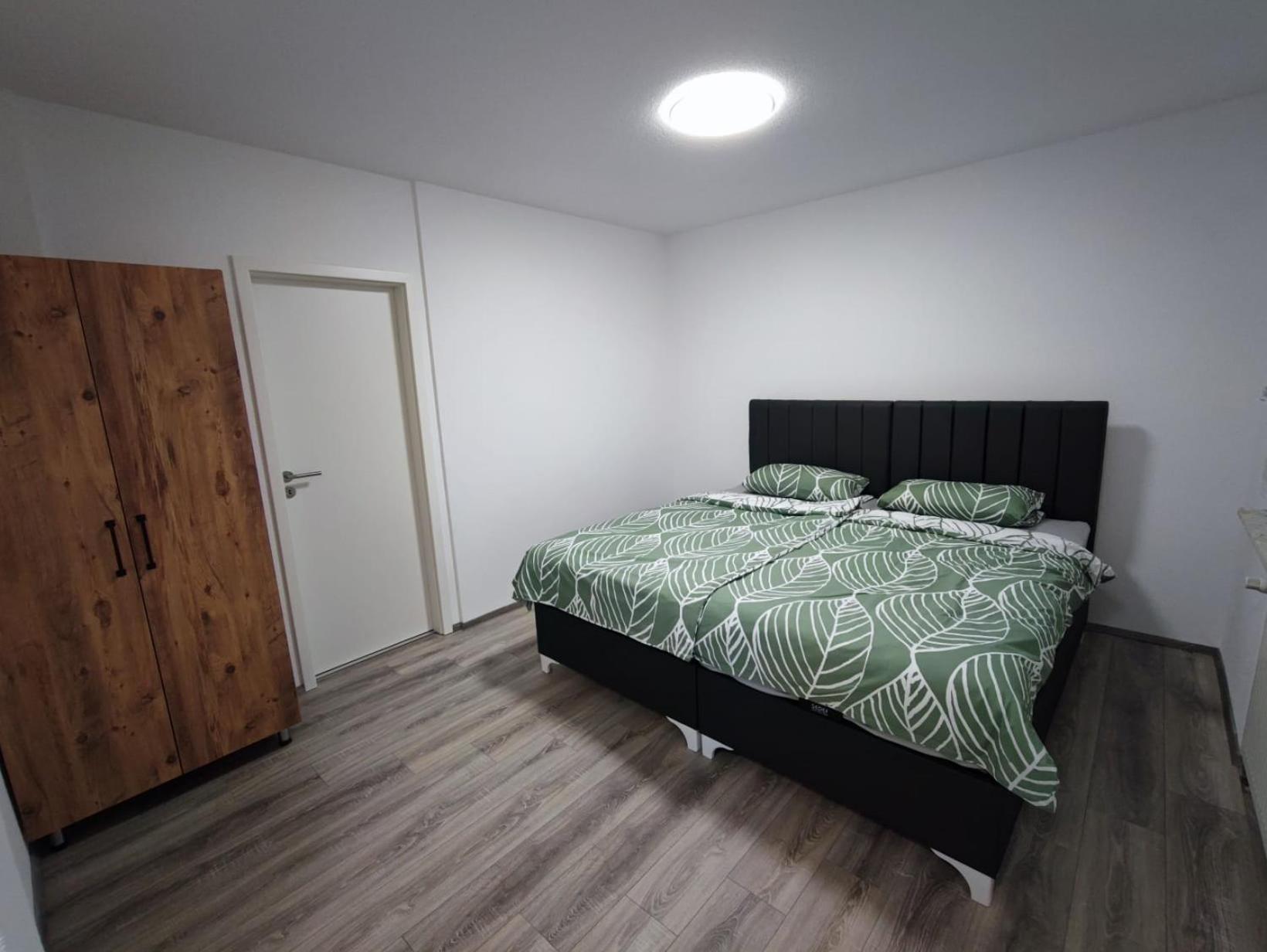 Three-Bedroom Apartment - Photo 2