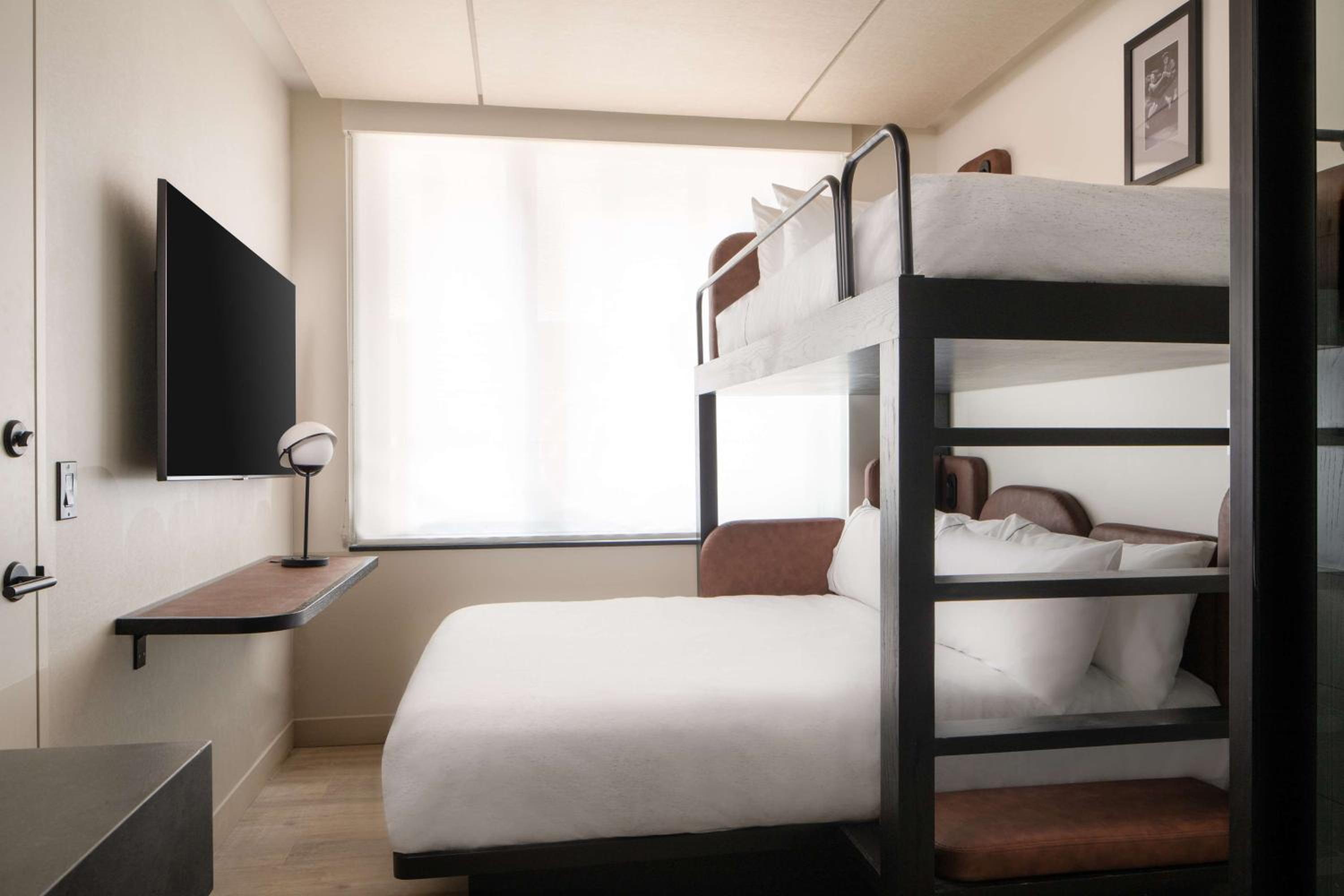 Room with One Twin Over Queen Bunk Bed