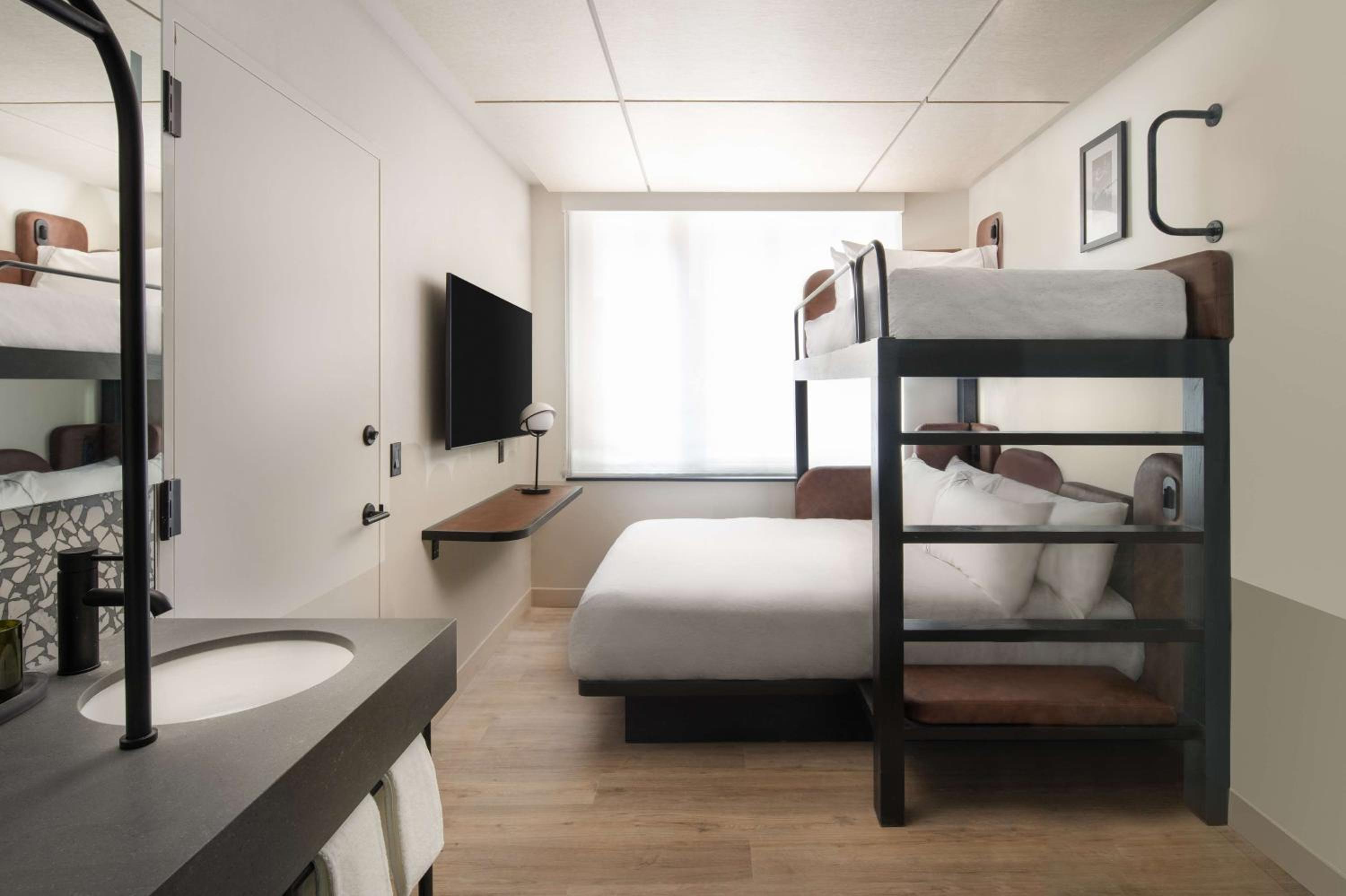Room with One Twin Over Queen Bunk Bed