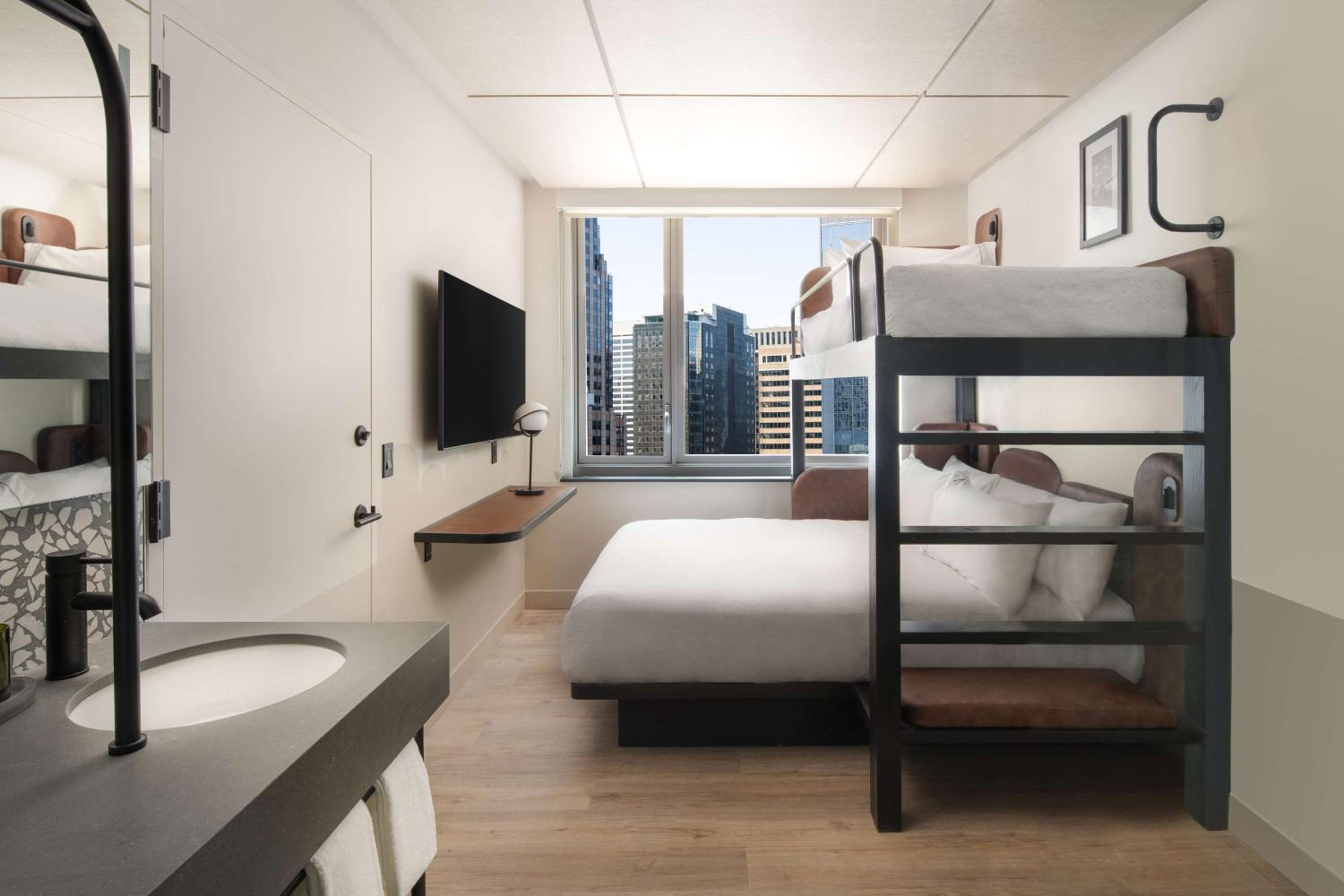 Bunk Room with City View, One Twin Bed and One Queen Bed