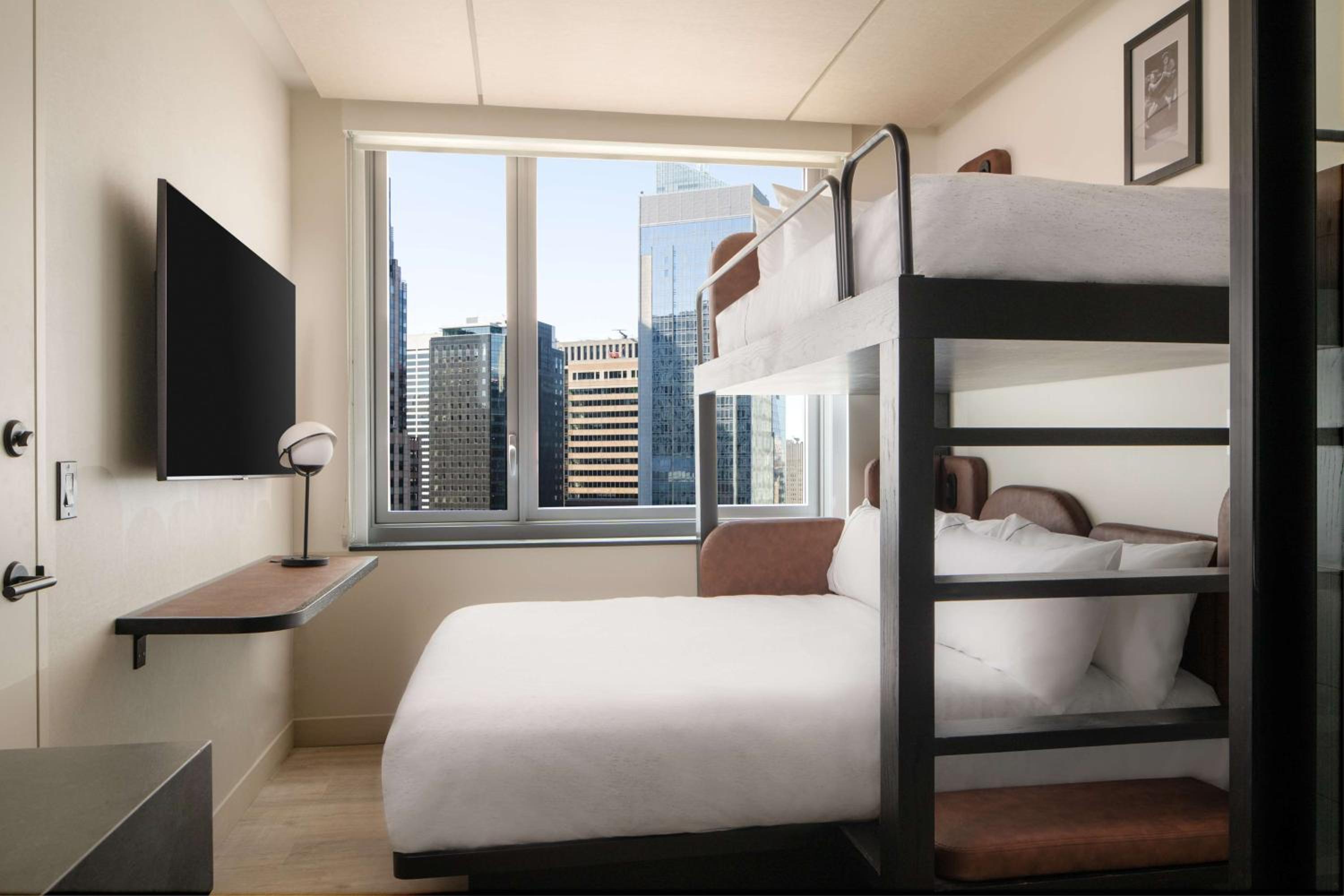 Bunk Room with City View, One Twin Bed and One Queen Bed