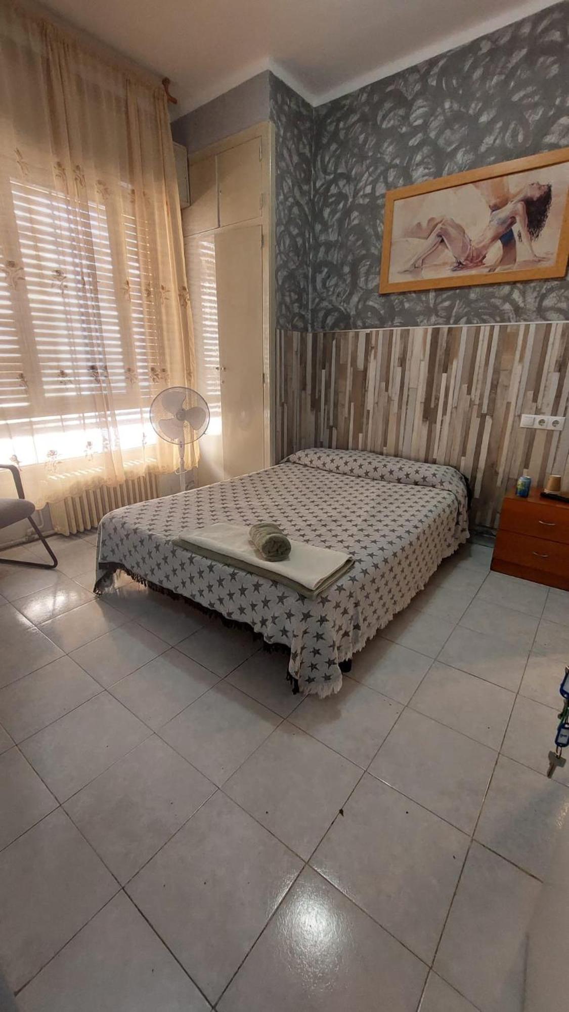 Habitación Estándar con Cama Queen