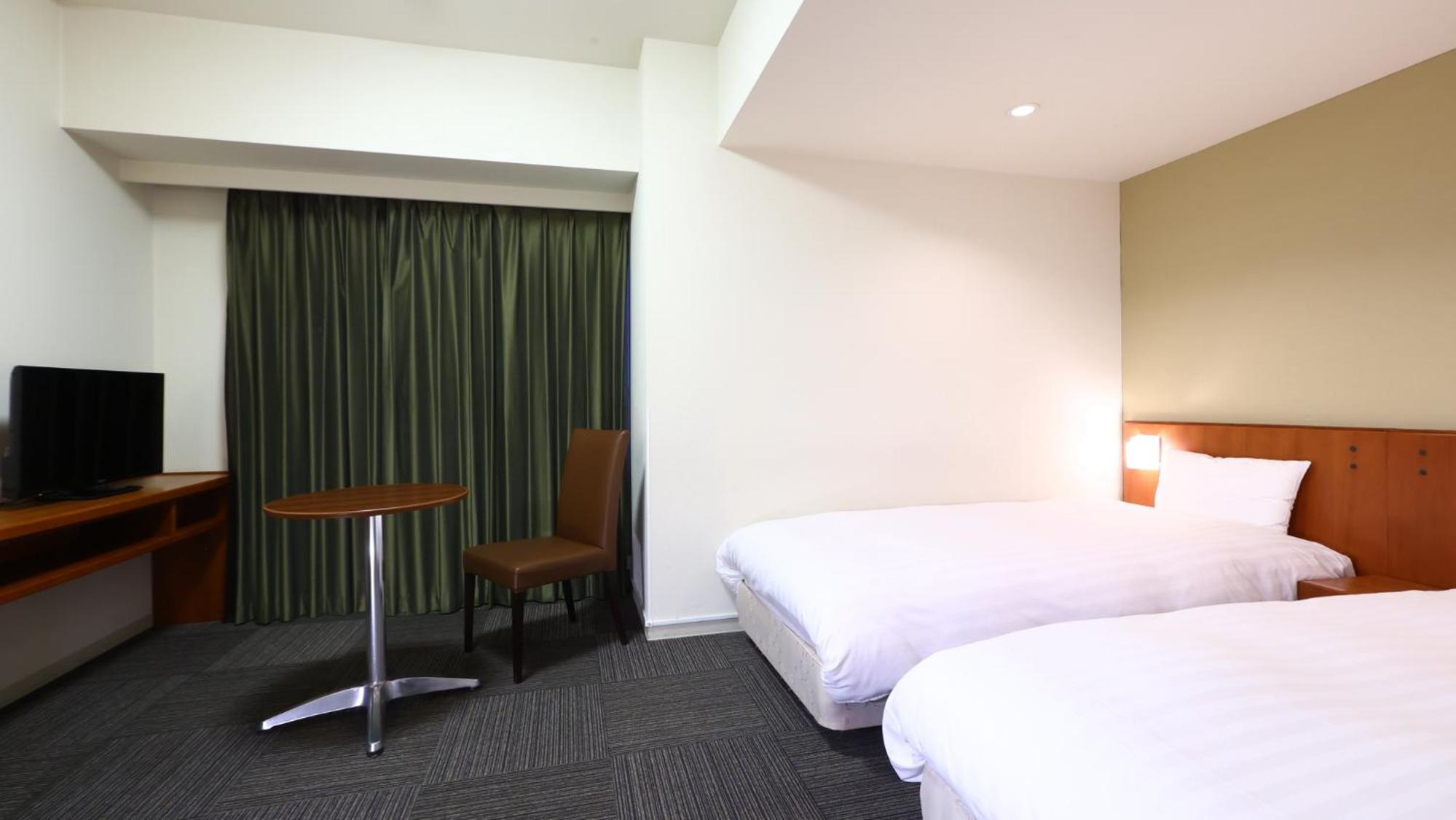 Twin Room - Non-Smoking - Photo 1