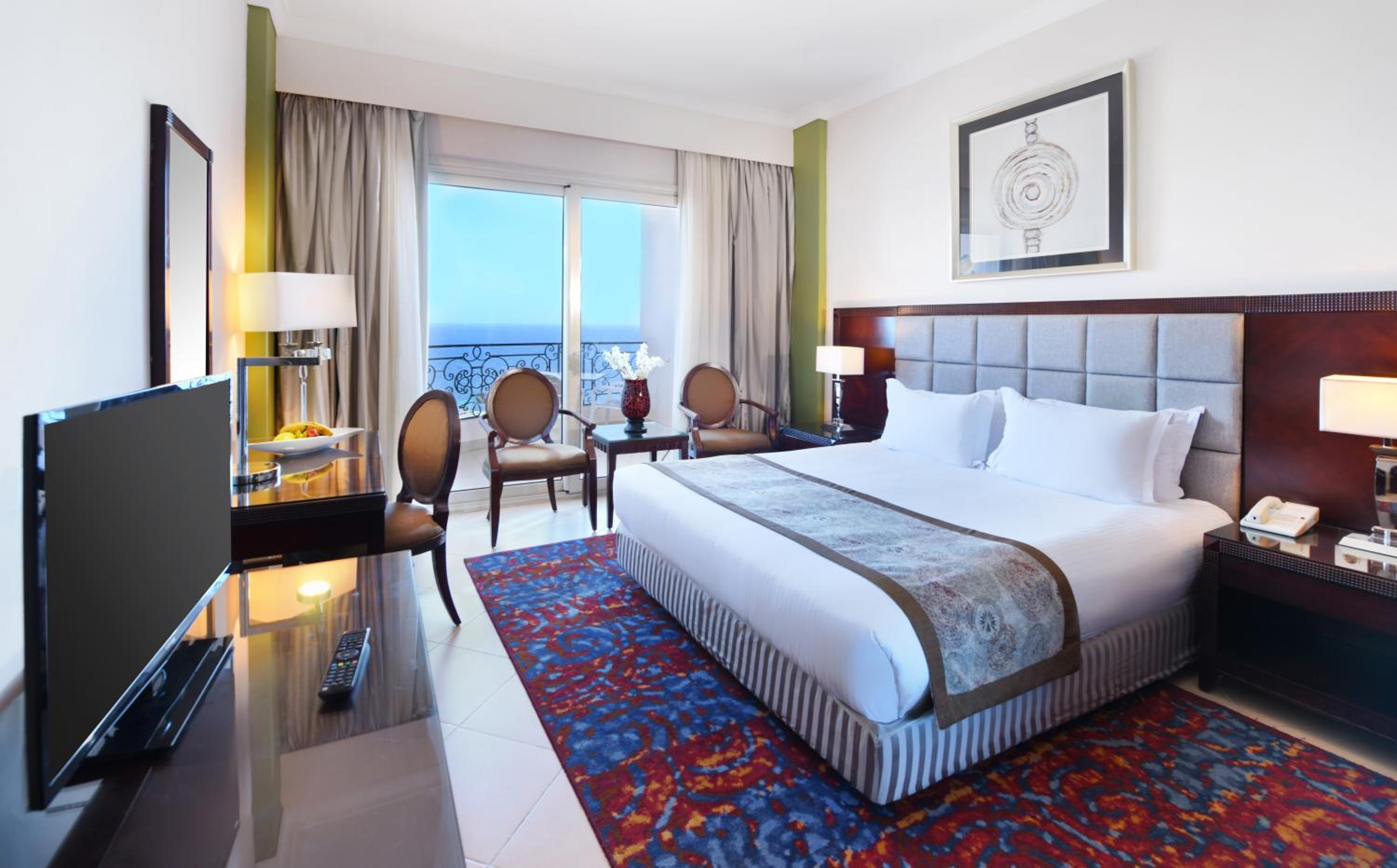 Two-Bedroom Suite with Sea and Pool View