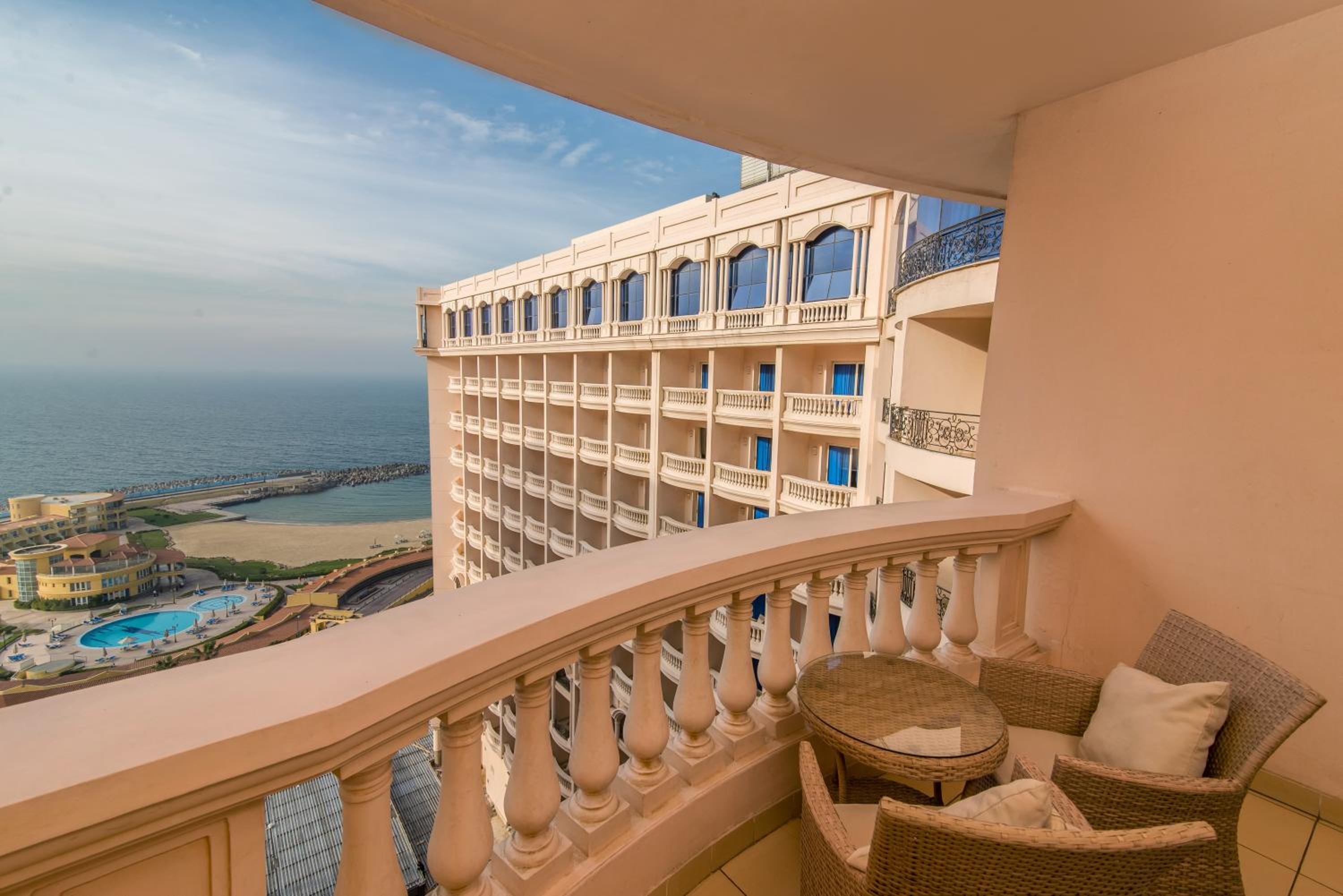 Two-Bedroom Suite with Sea and Pool View