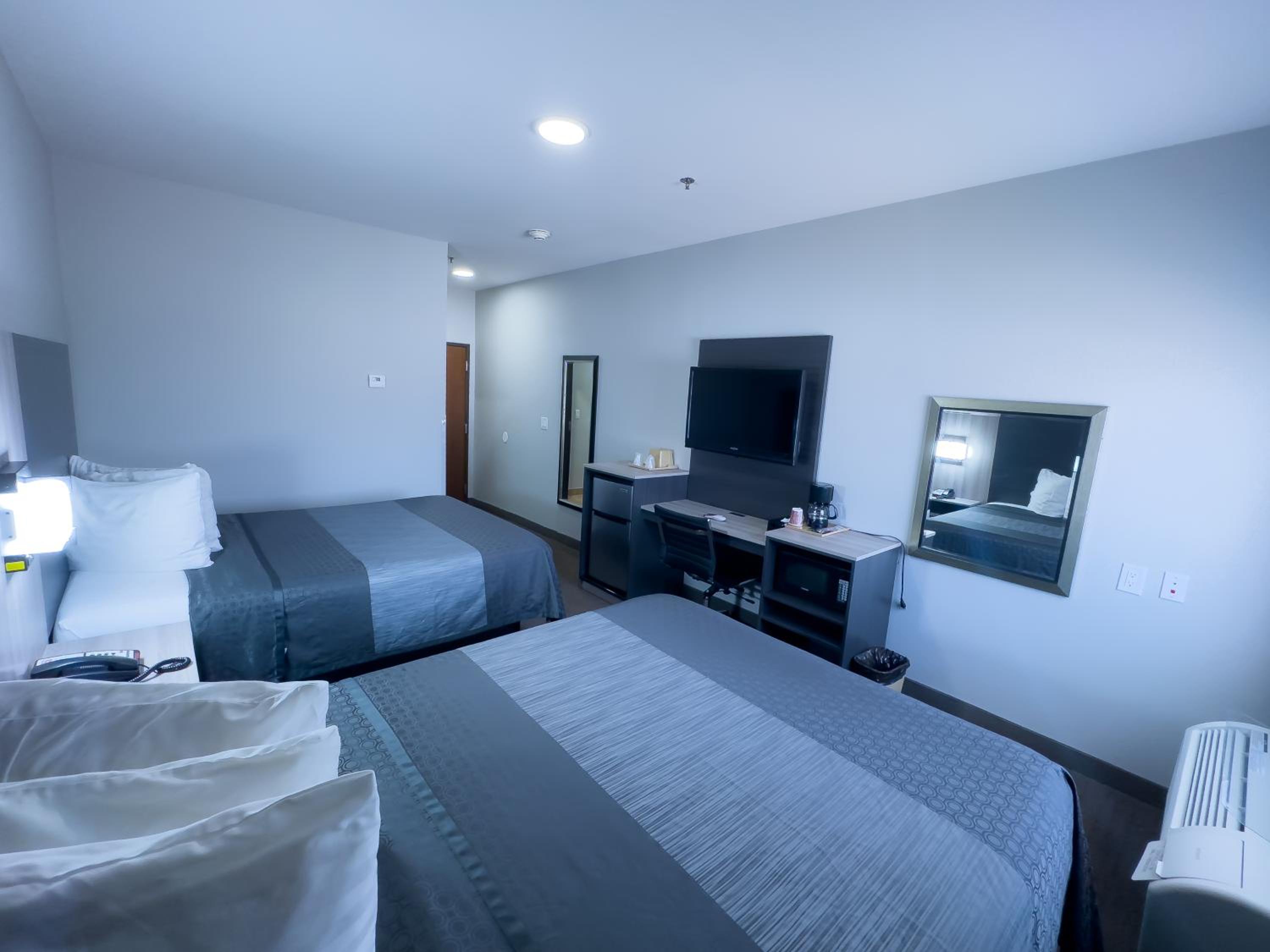 Queen Room with Two Queen Beds - Photo 1