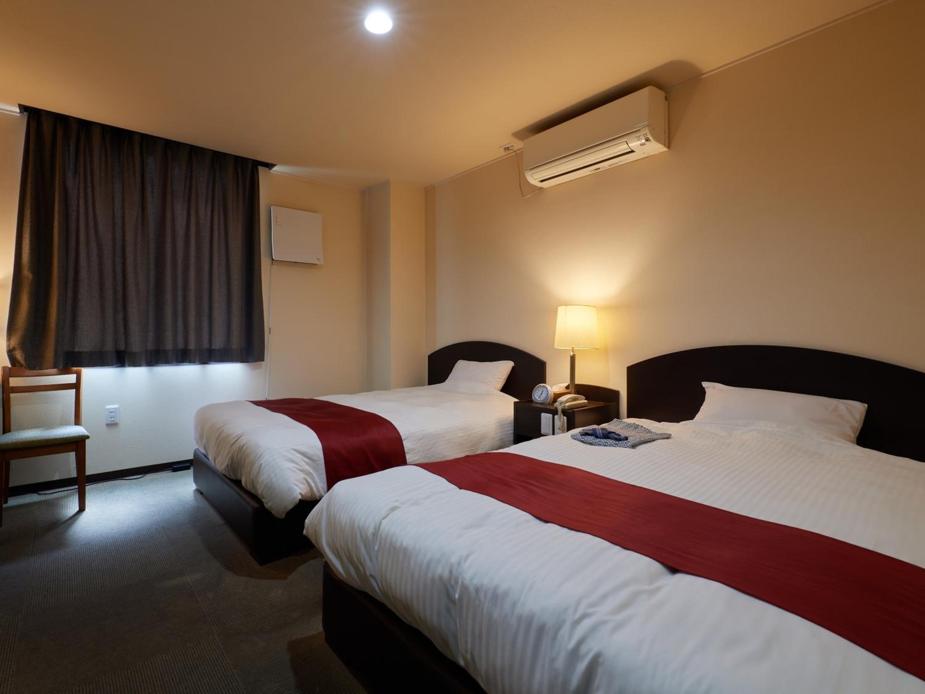 Standard Twin Room - Photo 7