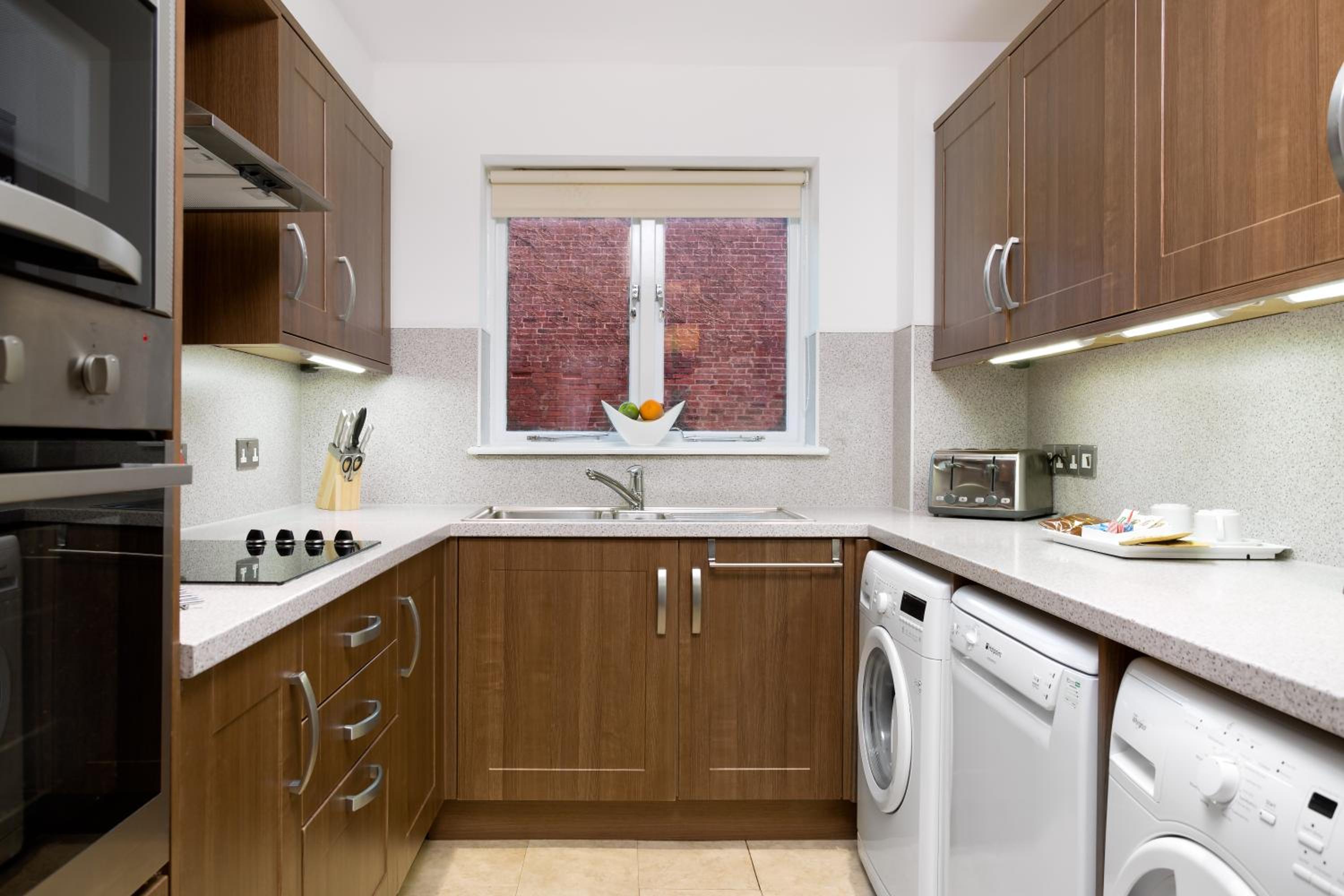 Three-Bedroom Apartment - Photo 10