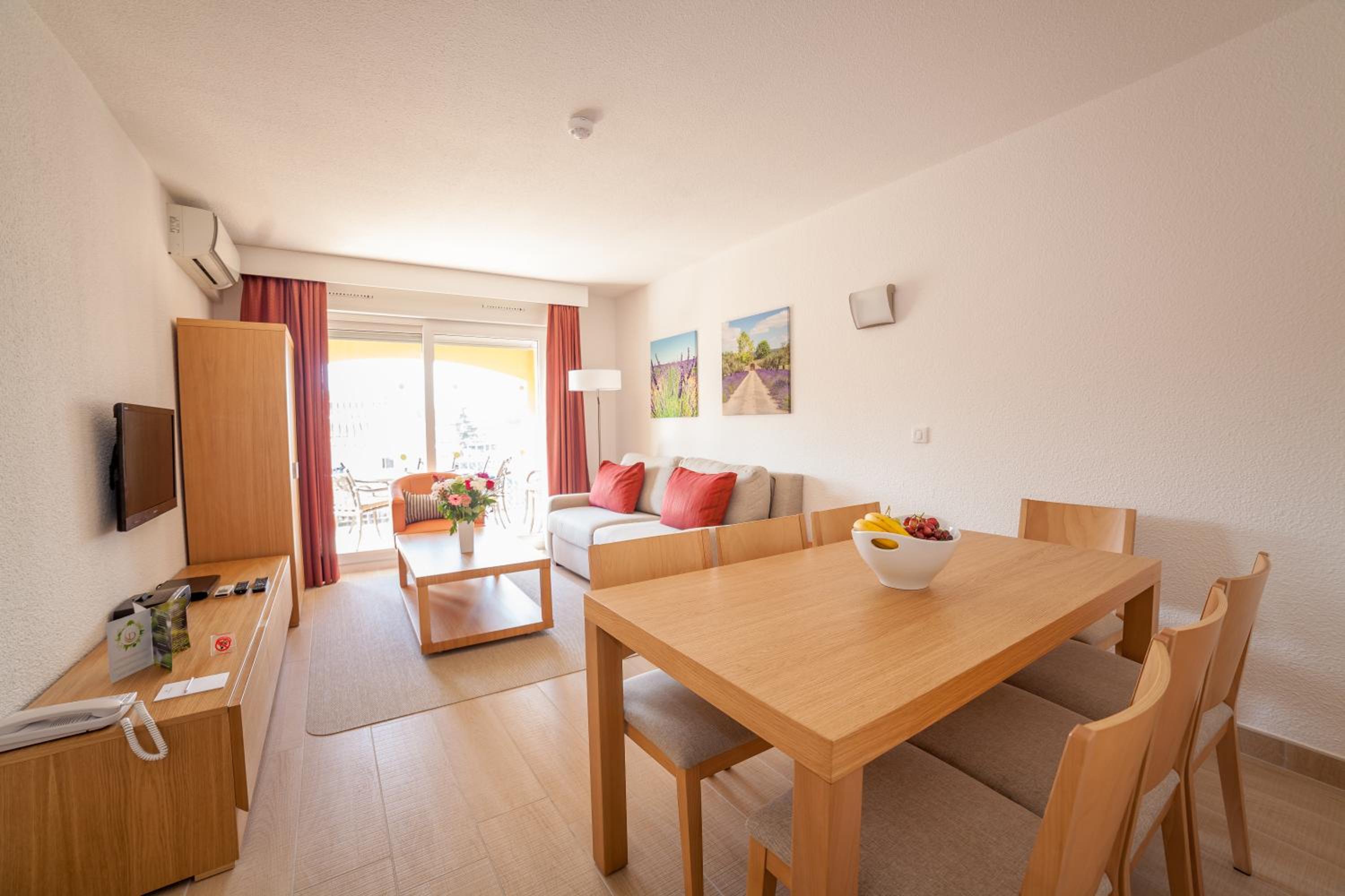 Three-Bedroom Apartment - Photo 2