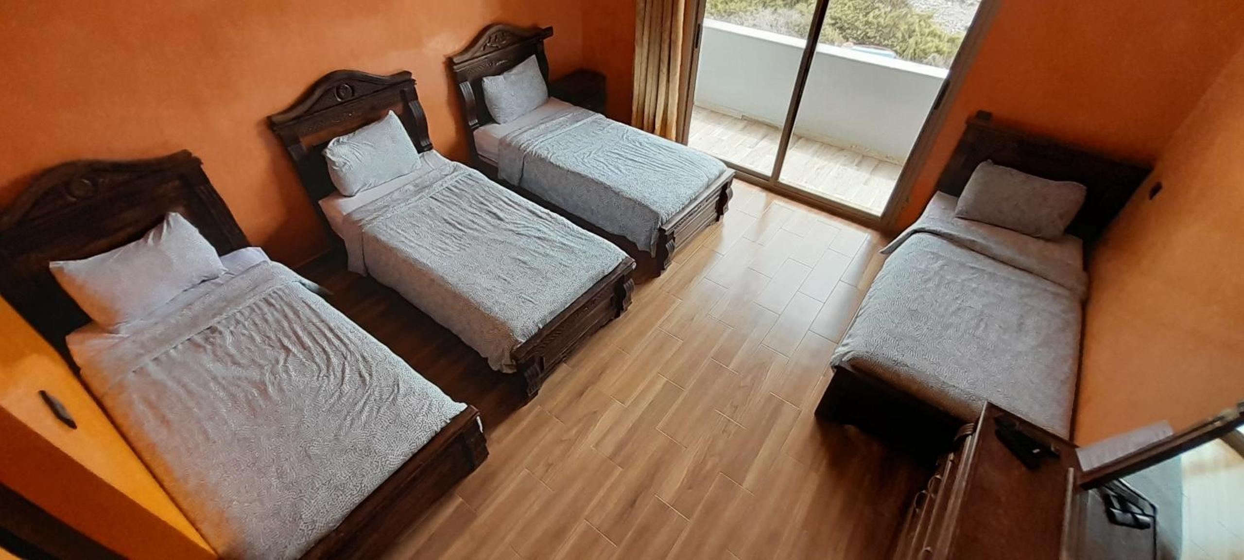 Quadruple Room with Balcony - Photo 3