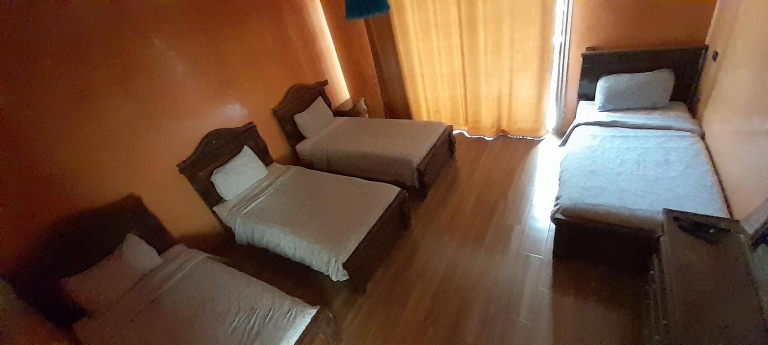 Quadruple Room with Balcony - Photo 1