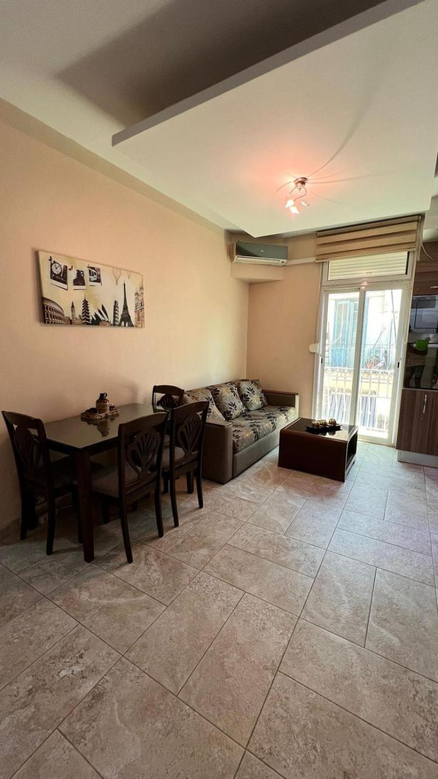 Three-Bedroom Apartment photo 1