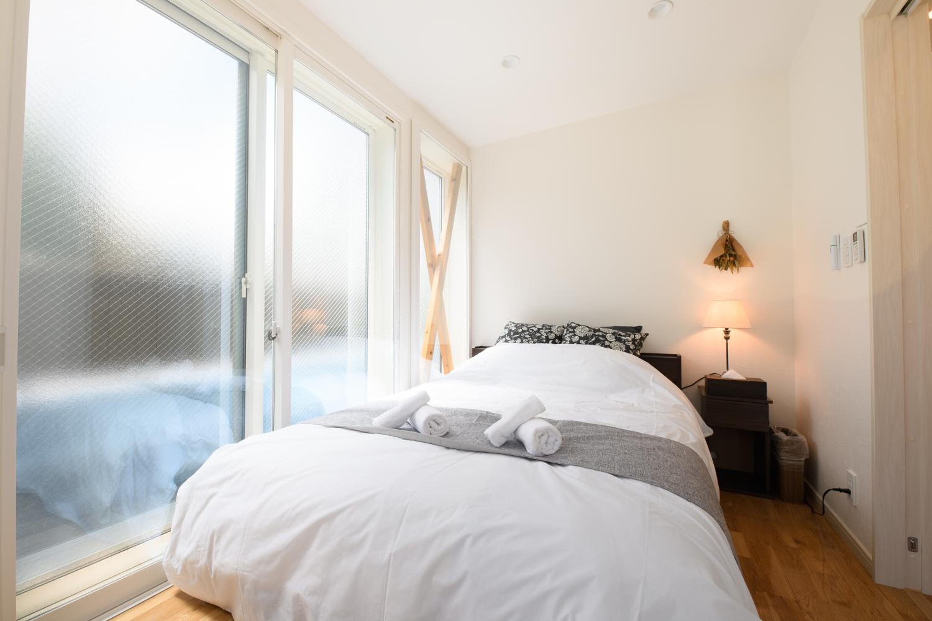 Three-Bedroom House - Photo 2